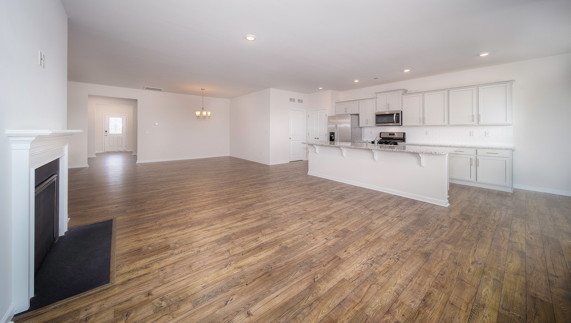 Family room with windows and fireplace