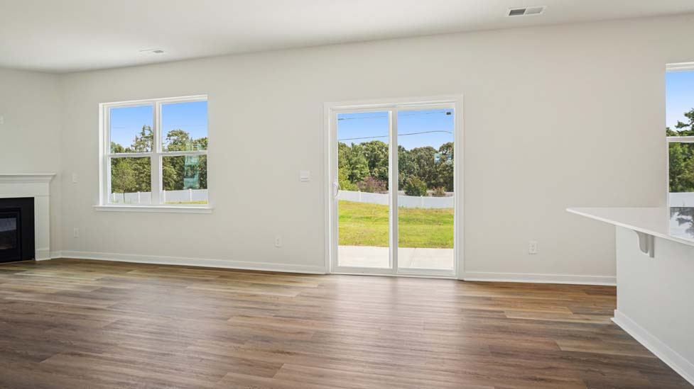 Living  room with large windows and fireplace