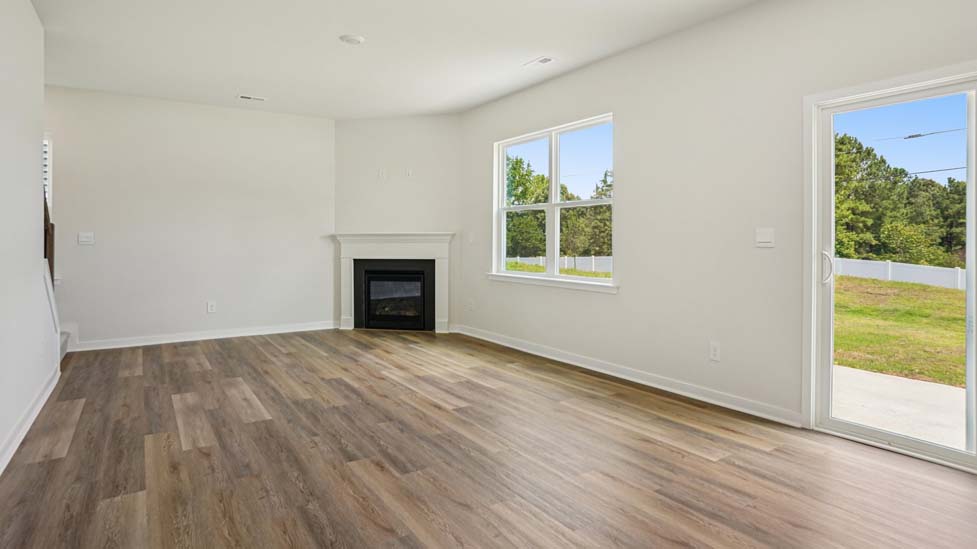 Living  room with large windows and fireplace