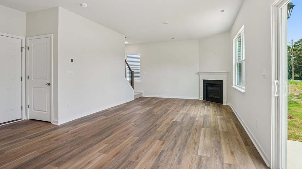 Living  room with large windows and fireplace
