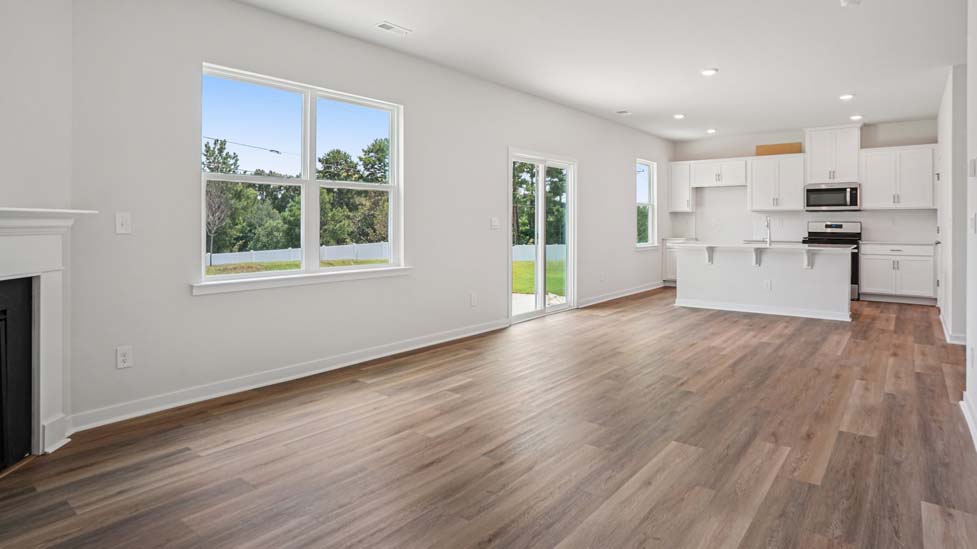 Living  room with large windows and fireplace
