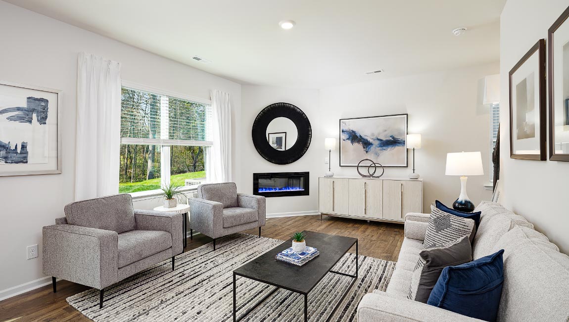 Living  room with large windows and fireplace