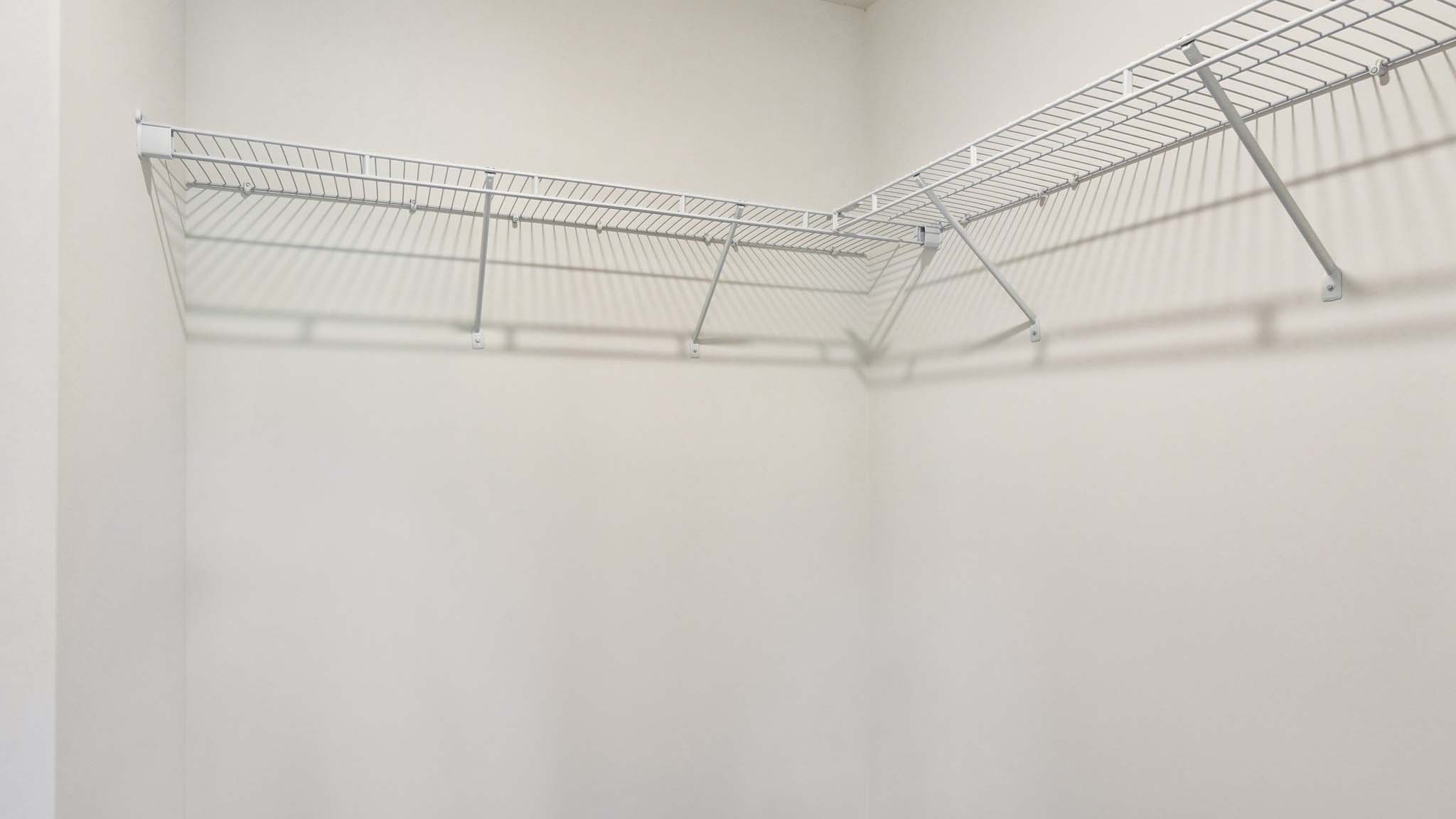 Walk in closet with rack for hangers
