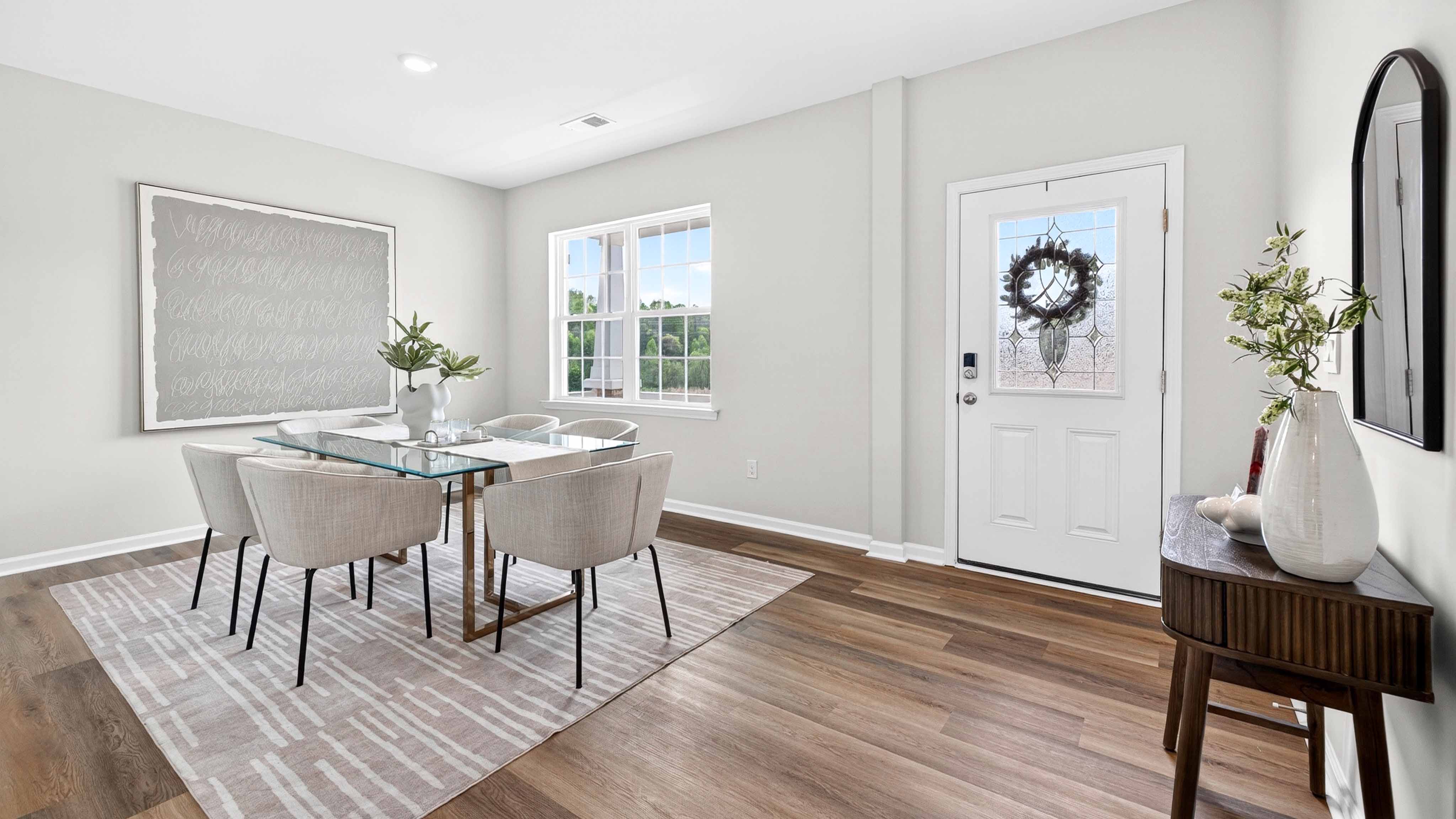Welcoming foyer with dining room to the right