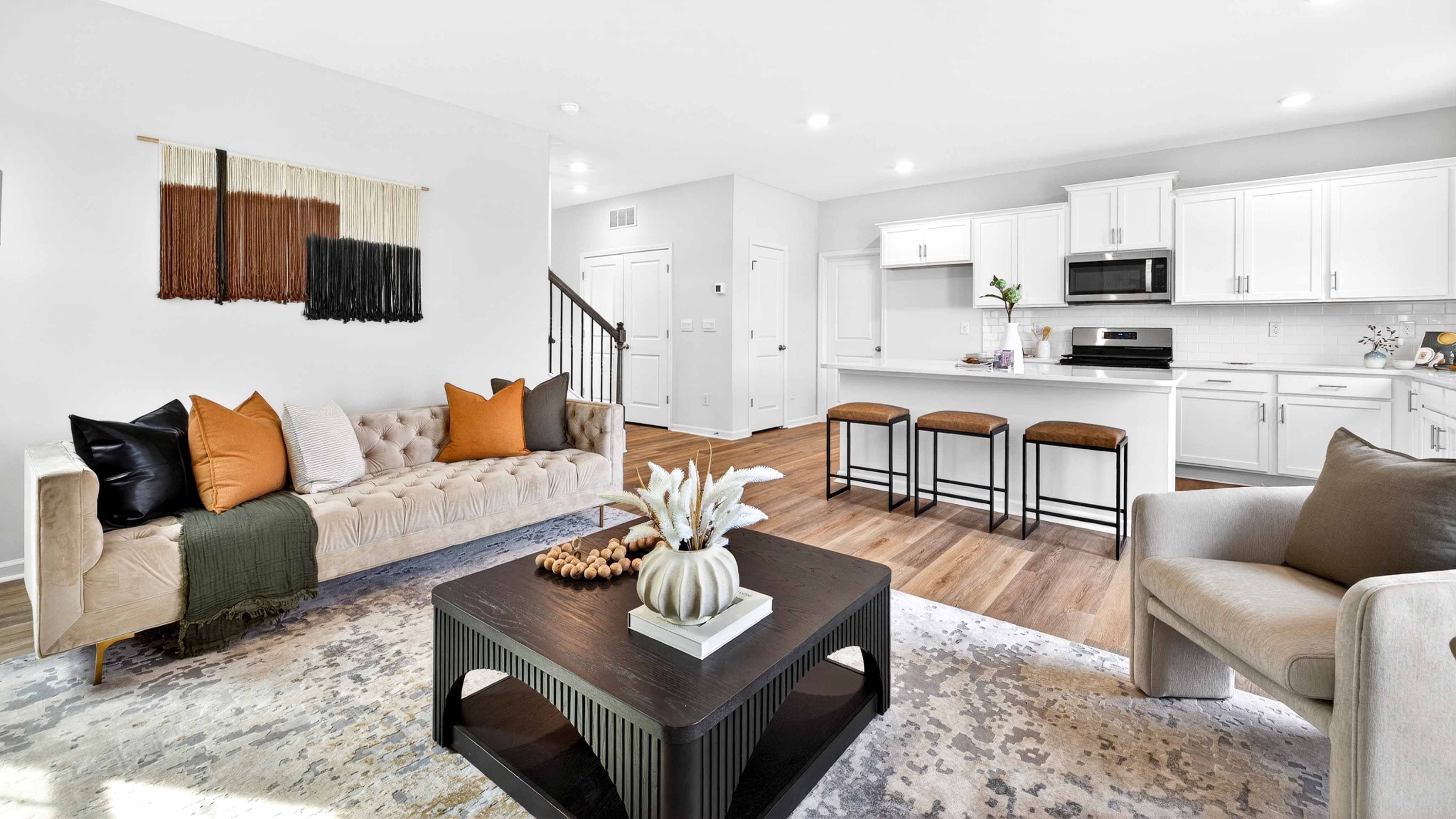 Open family room with fireplace and windows on either side