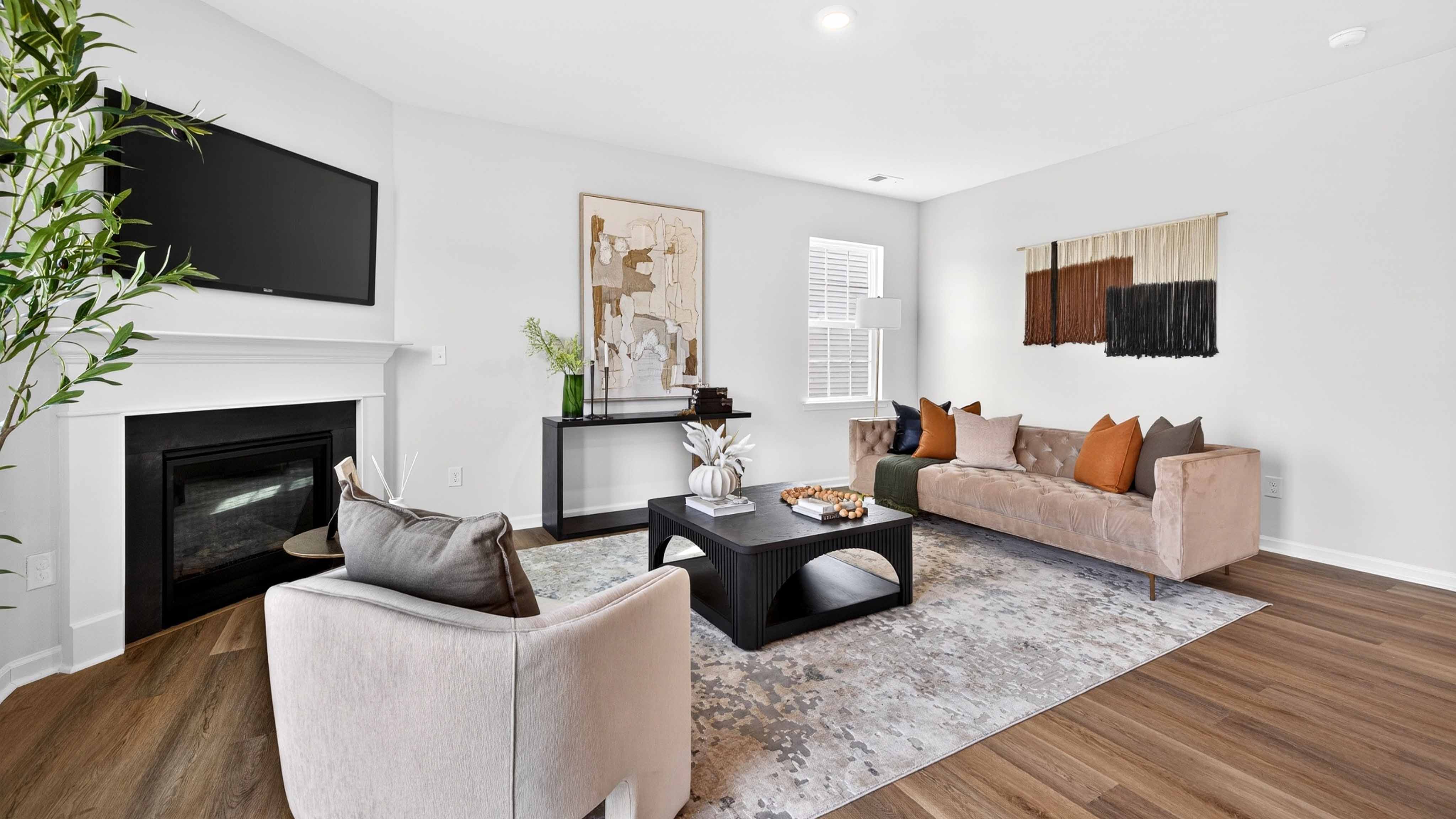 Open family room with fireplace and windows on either side