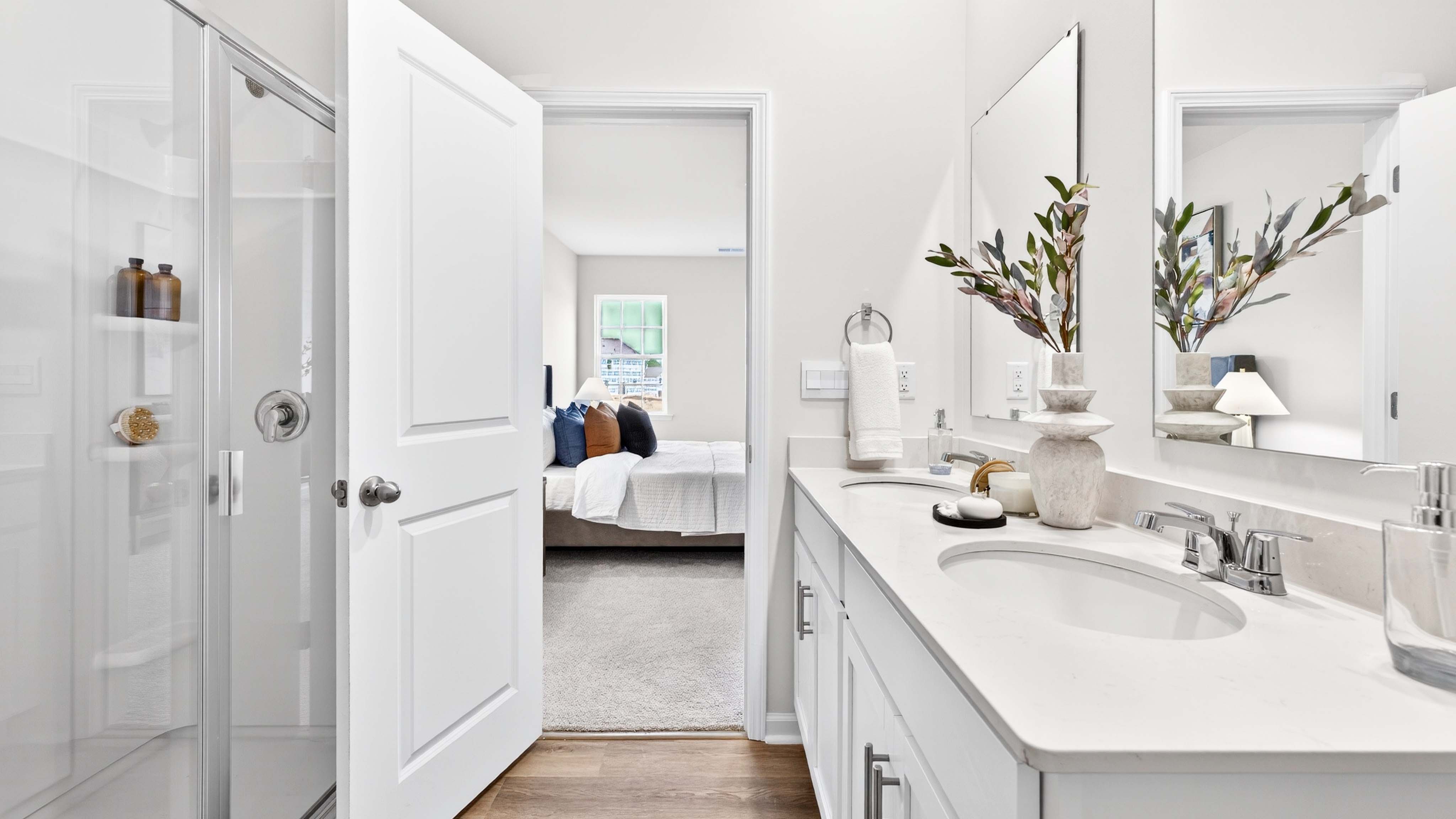 Primary bathroom with double sinks, and bathtub