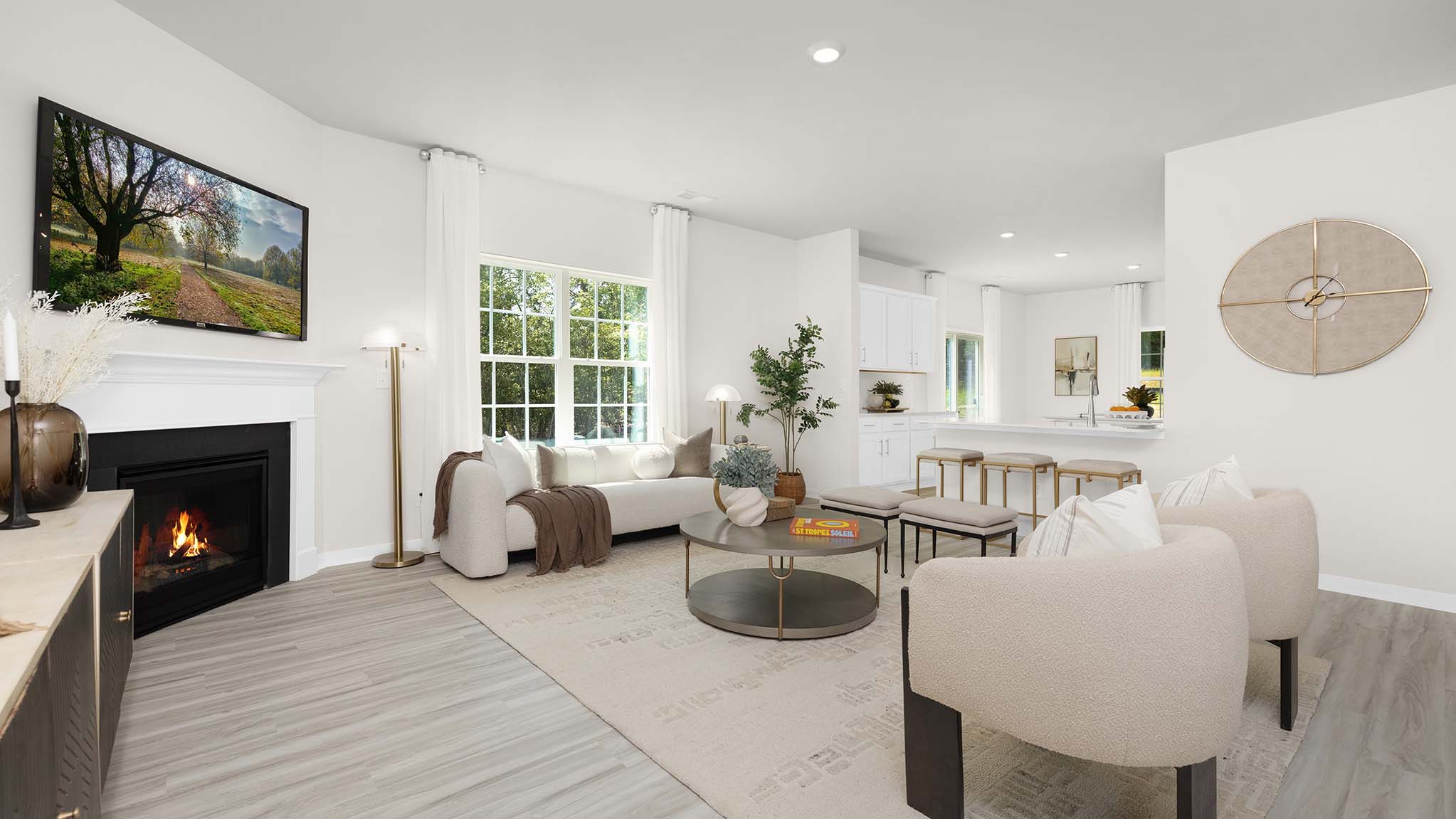 Open family room with windows and fireplace