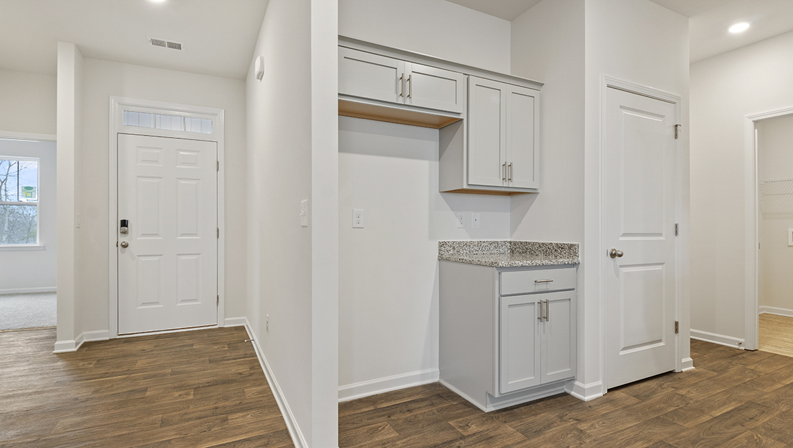 Hard wood floors hallway by the kitchen