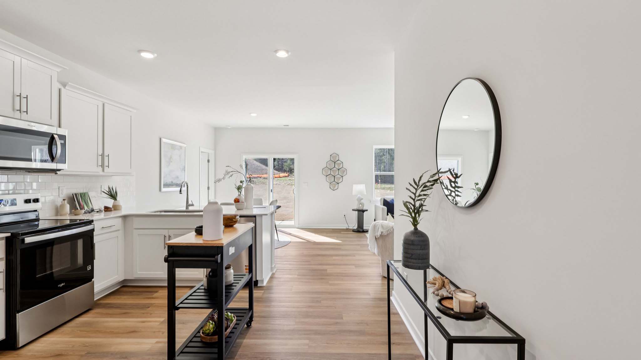 Kitchen with white cabinets and stainless steel appliances