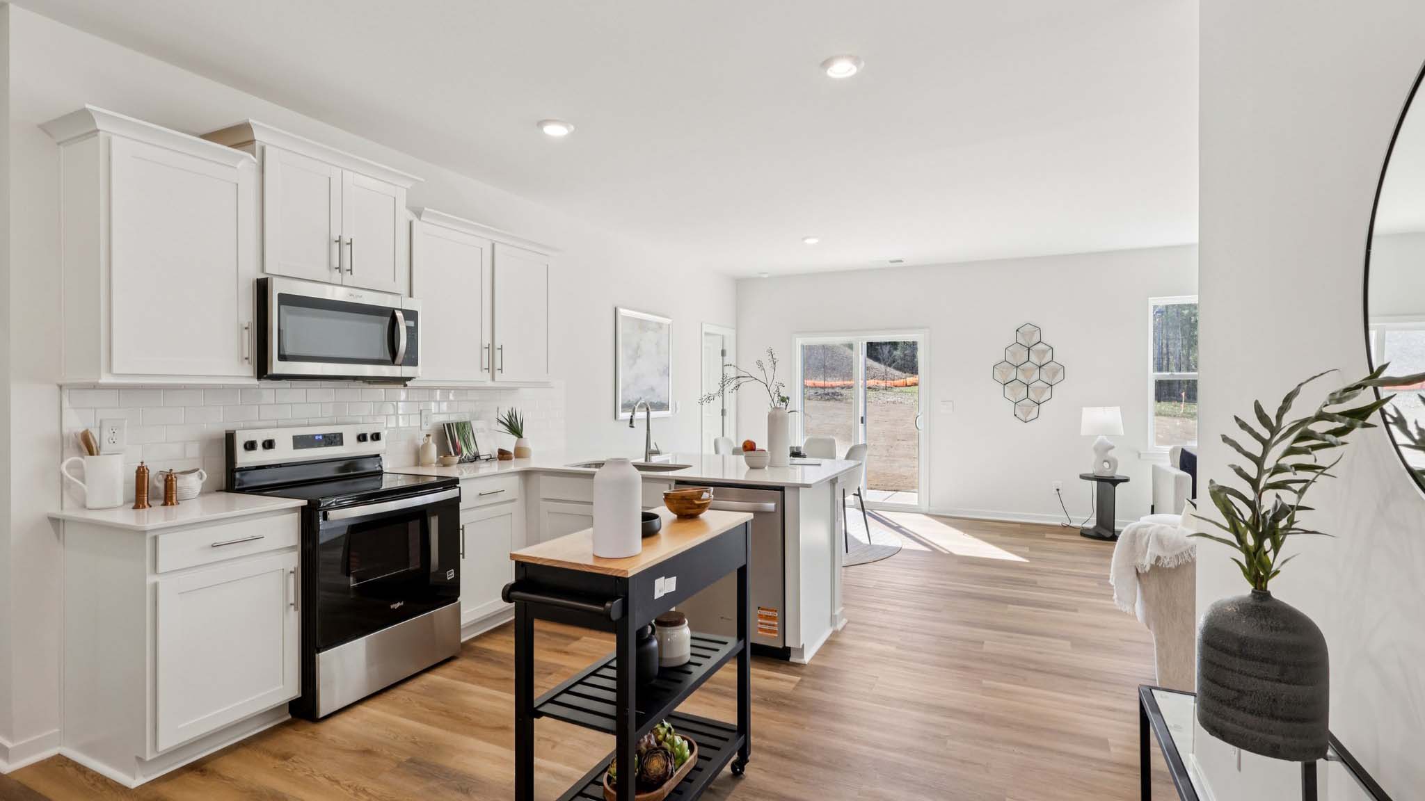 Kitchen with white cabinets and stainless steel appliances