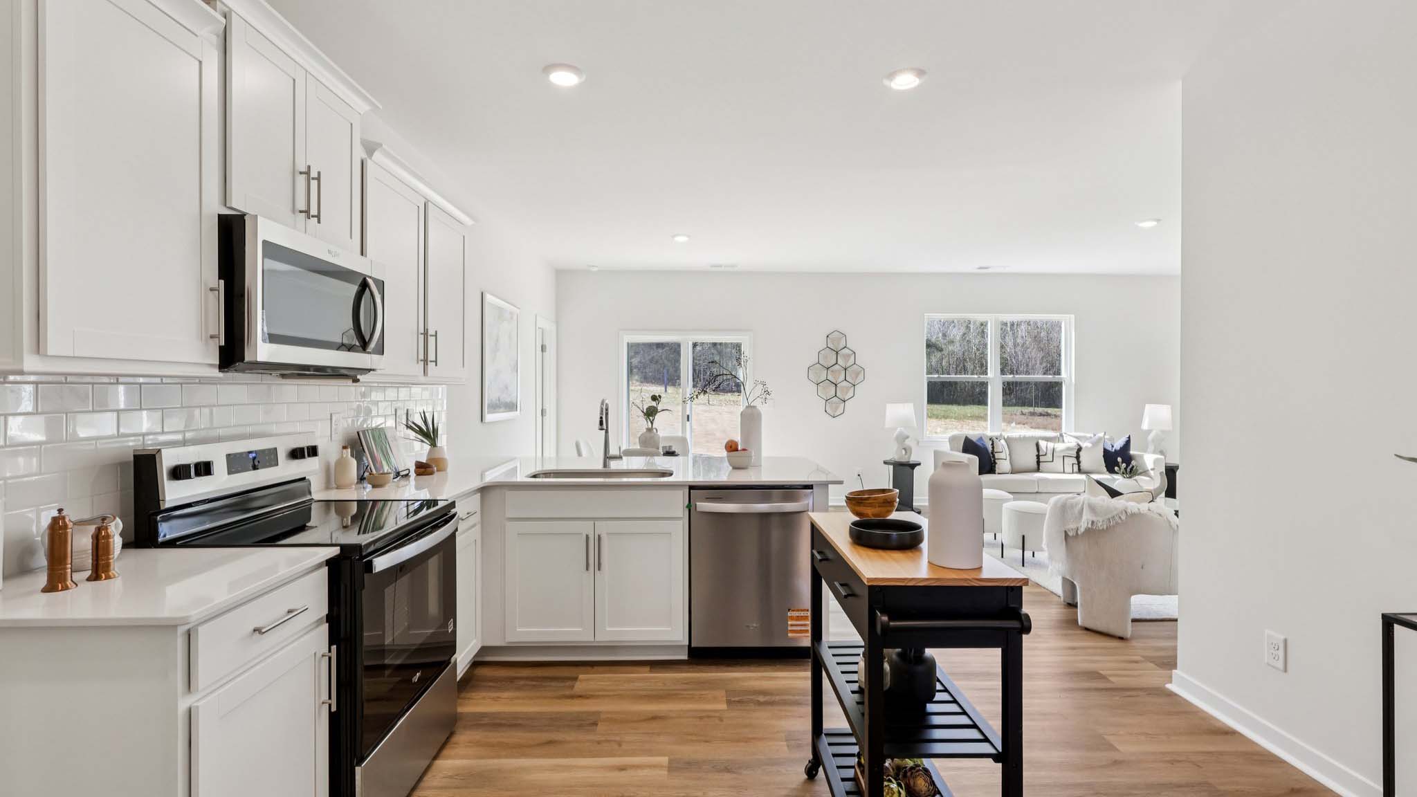 Kitchen with white cabinets and stainless steel appliances