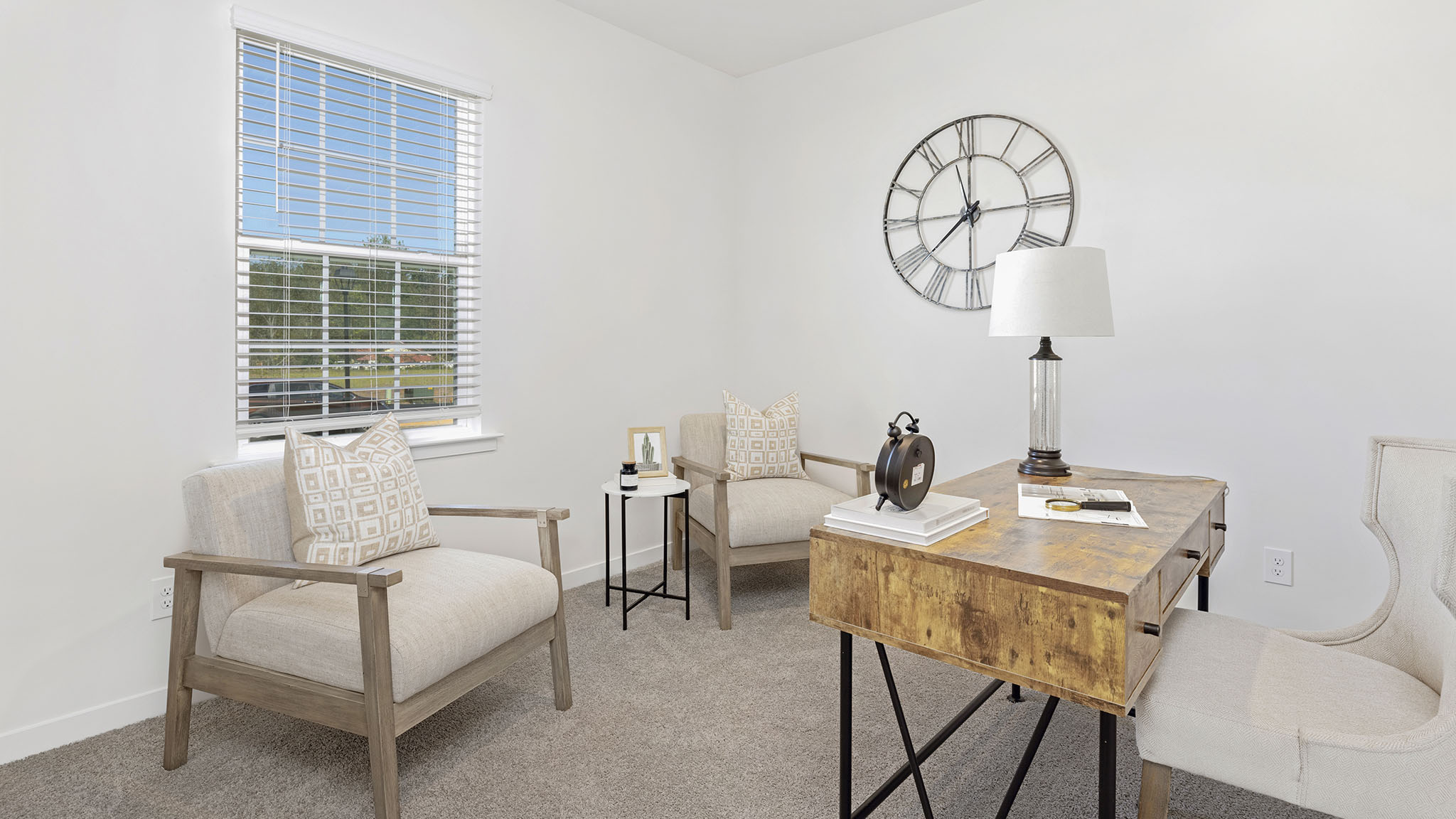 Carpeted bedroom with large window