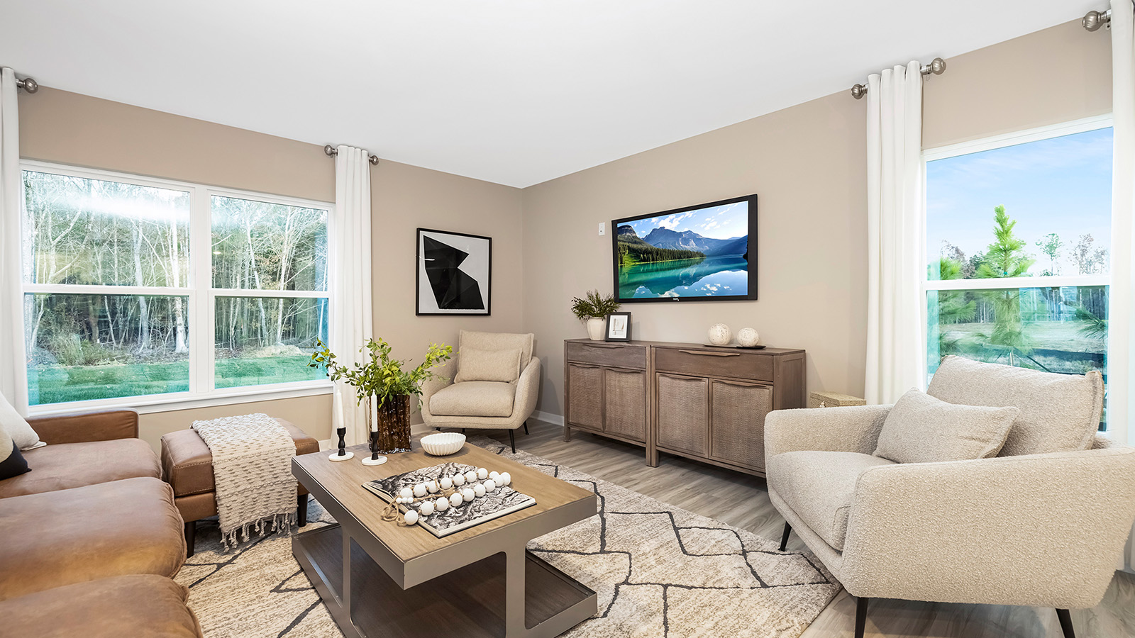 Spacious family room with windows and fireplace