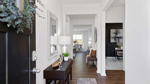 Welcoming foyer with wood floors, view of home interior