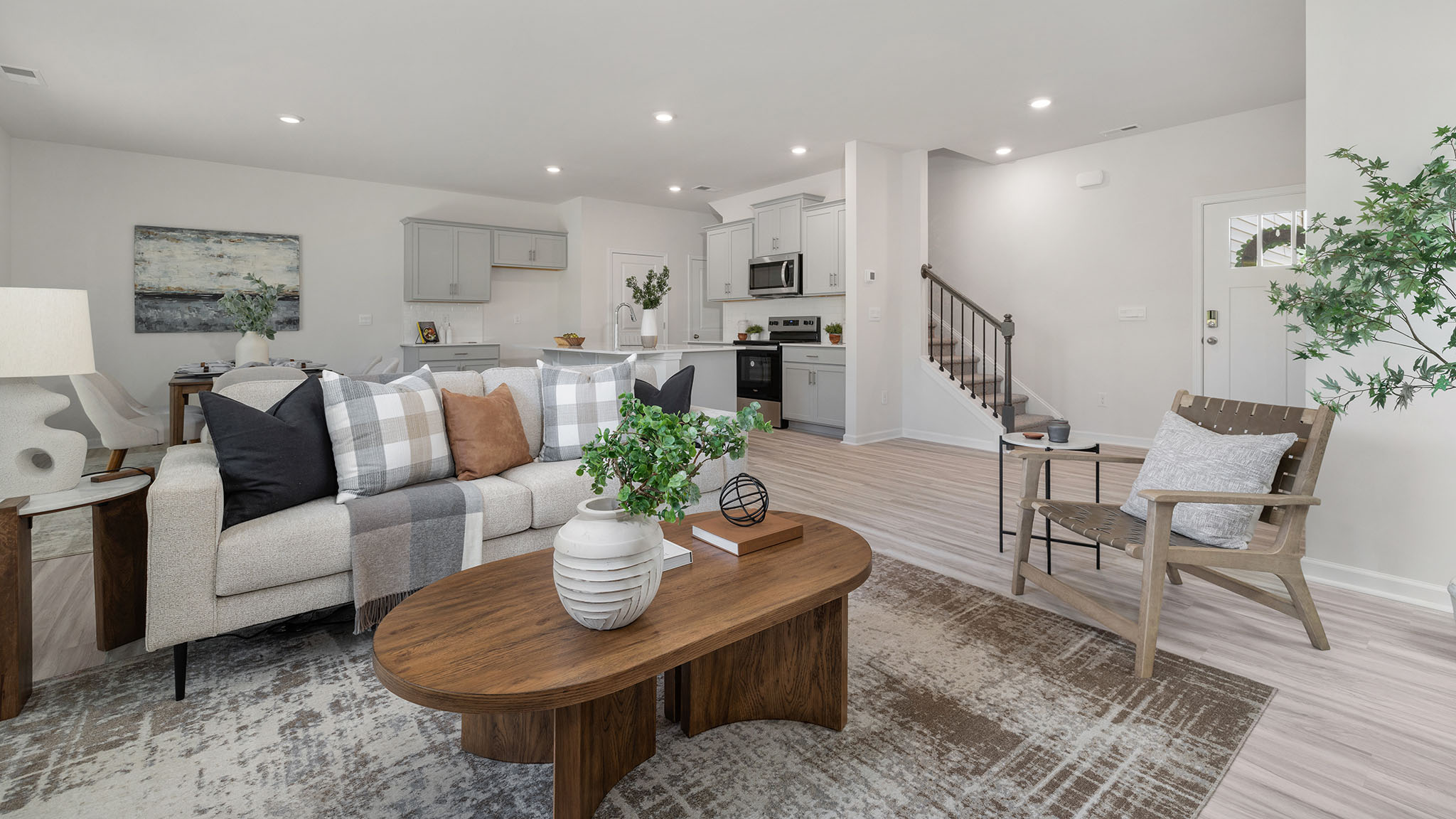 Spacious family room with large windows and fireplace