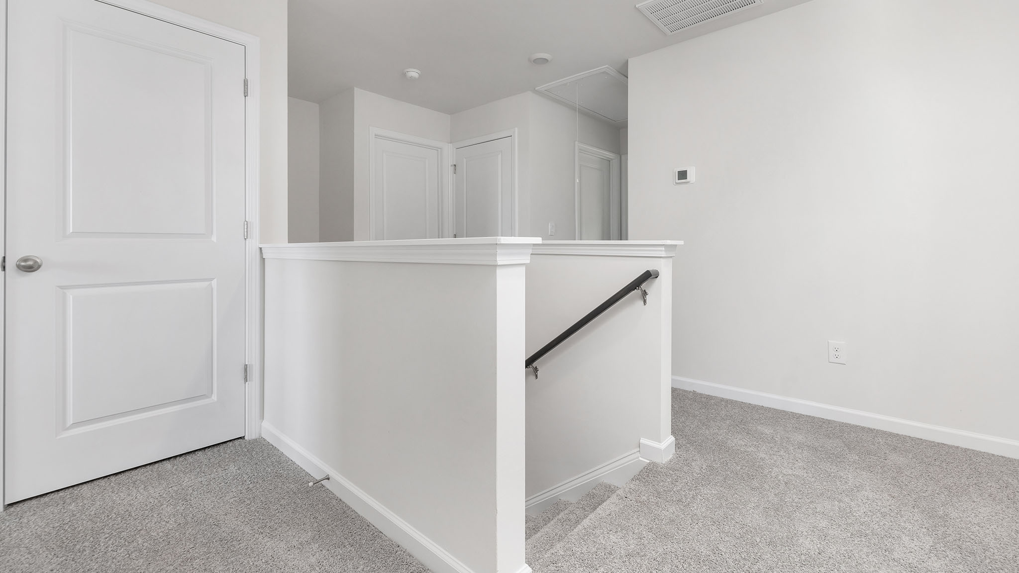 Upstairs carpeted landing