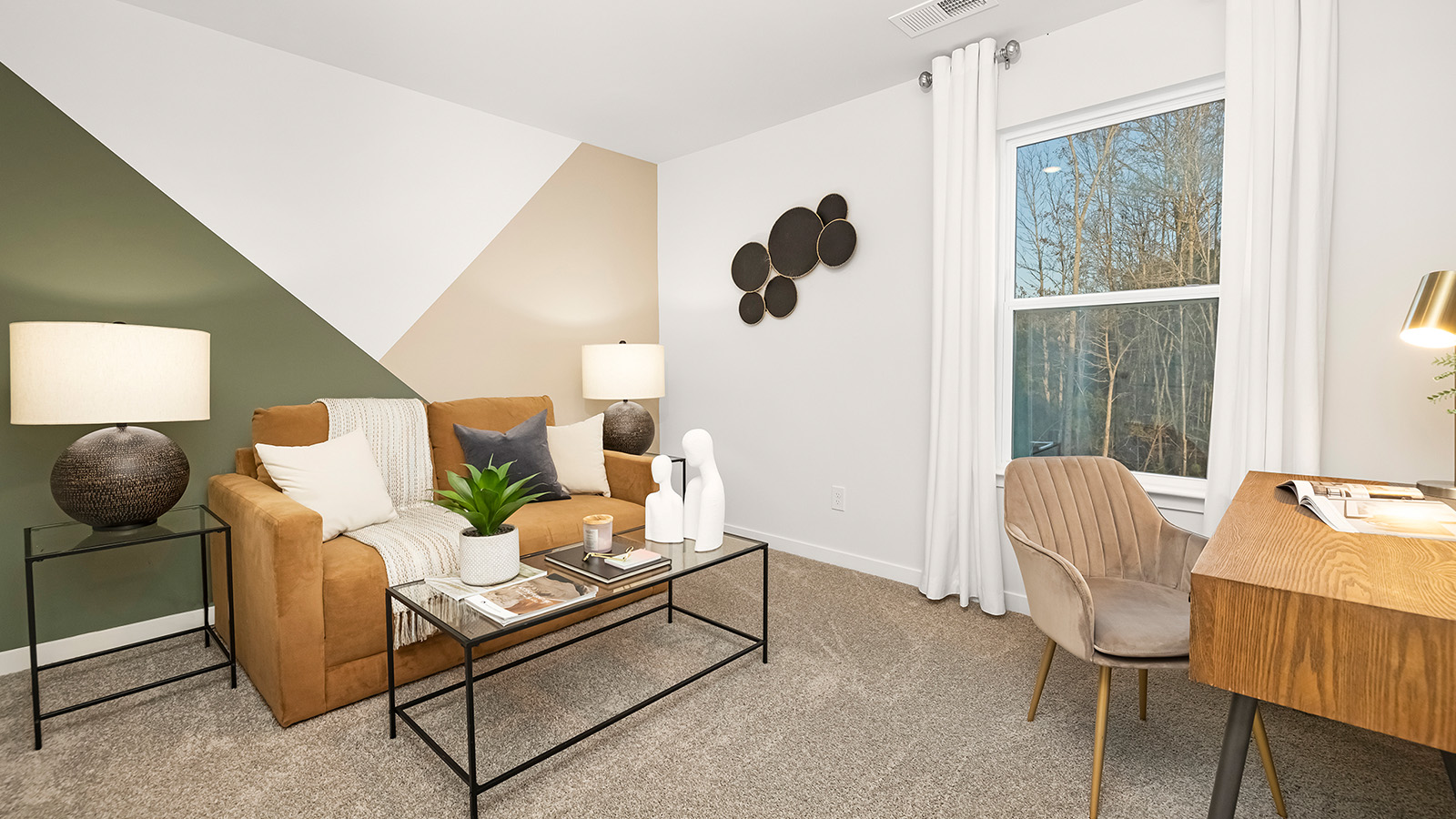 Carpeted bedroom with small window