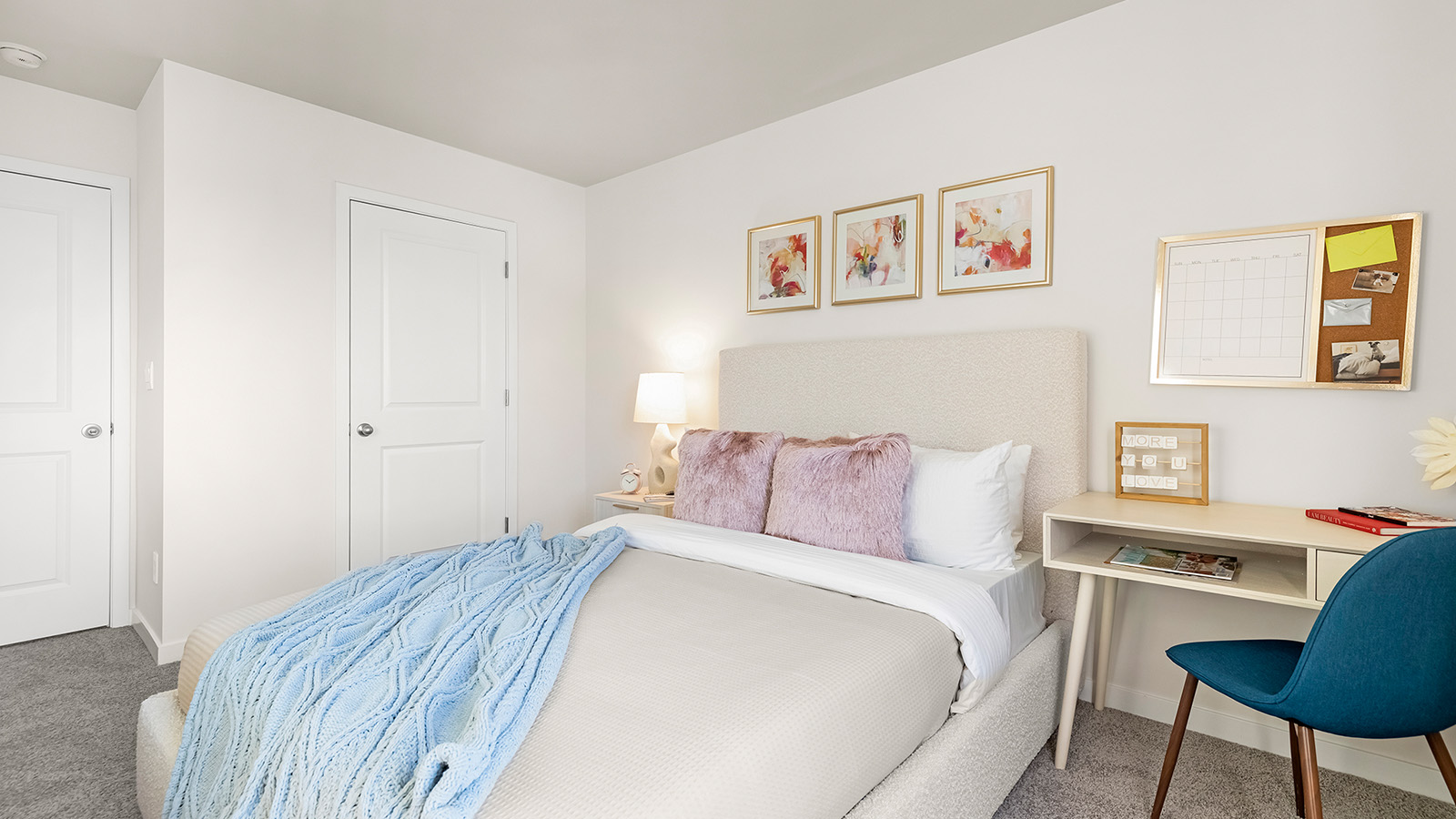 Carpeted bedroom with small window