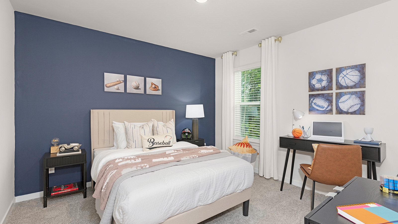 Carpeted bedroom with large window