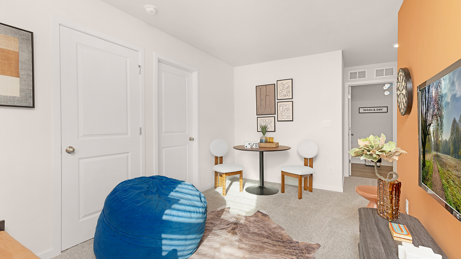 Carpeted bedroom with large window