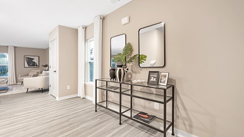 Welcoming Foyer view of interior of home
