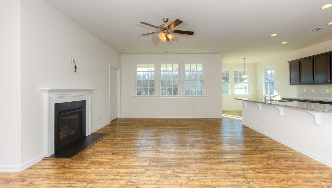 Family room with windows and fireplace