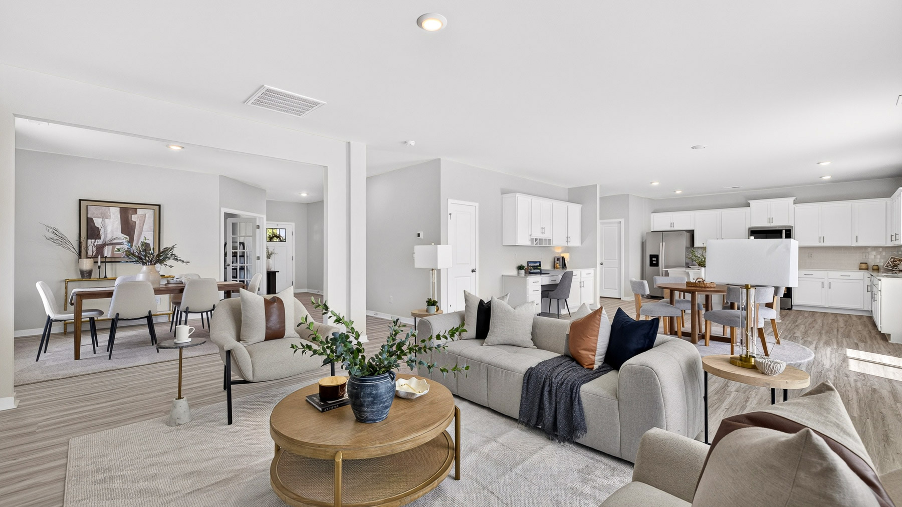 Living room area with fireplace and windows