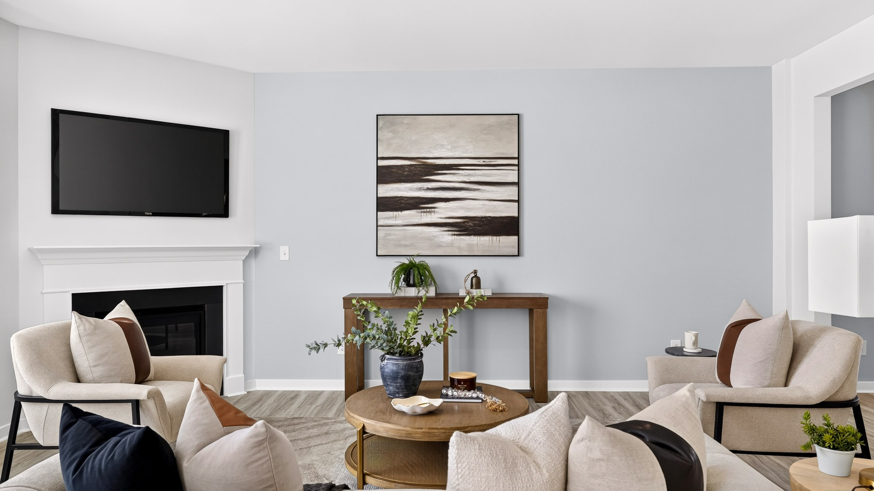 Living room area with fireplace and windows