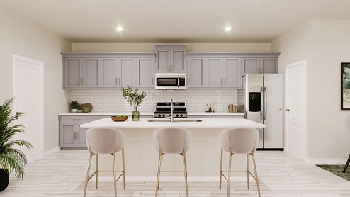 Kitchen and island with grey cabinets, white counters, white subway tile backsplash and stainless steel appliances