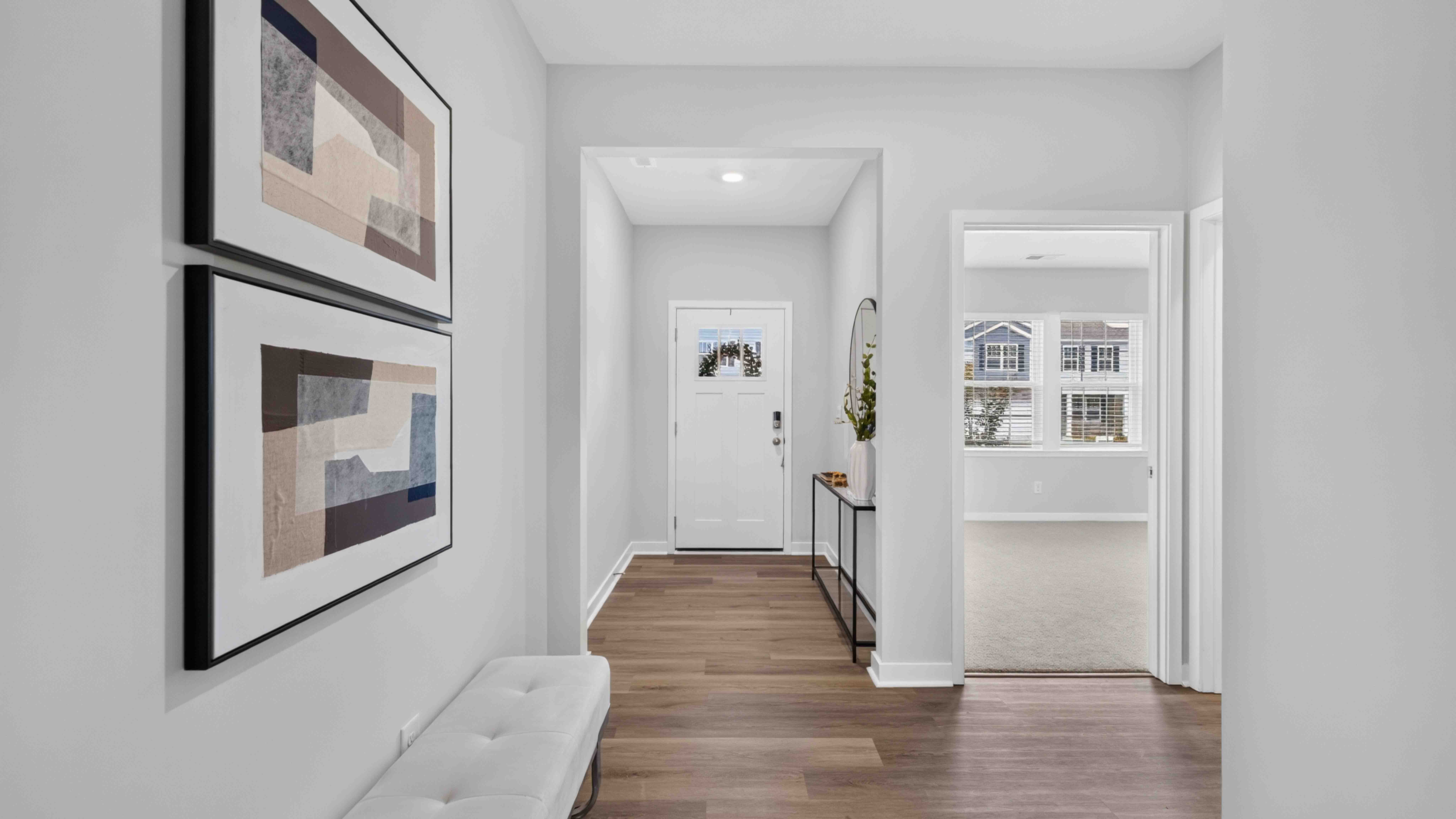 Welcoming foyer with view of hallway