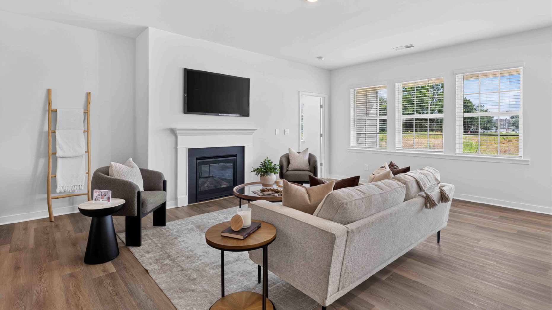 Family room with windows and fireplace
