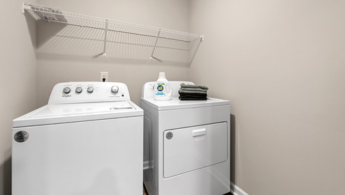Walk in laundry room.