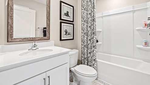 Bathroom with vanity and tub.
