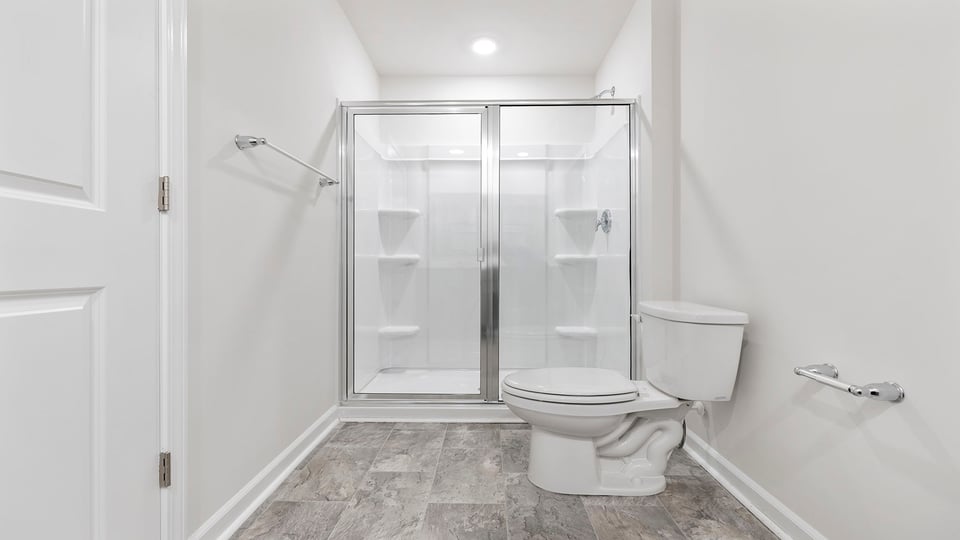 Bathroom with walk in shower.