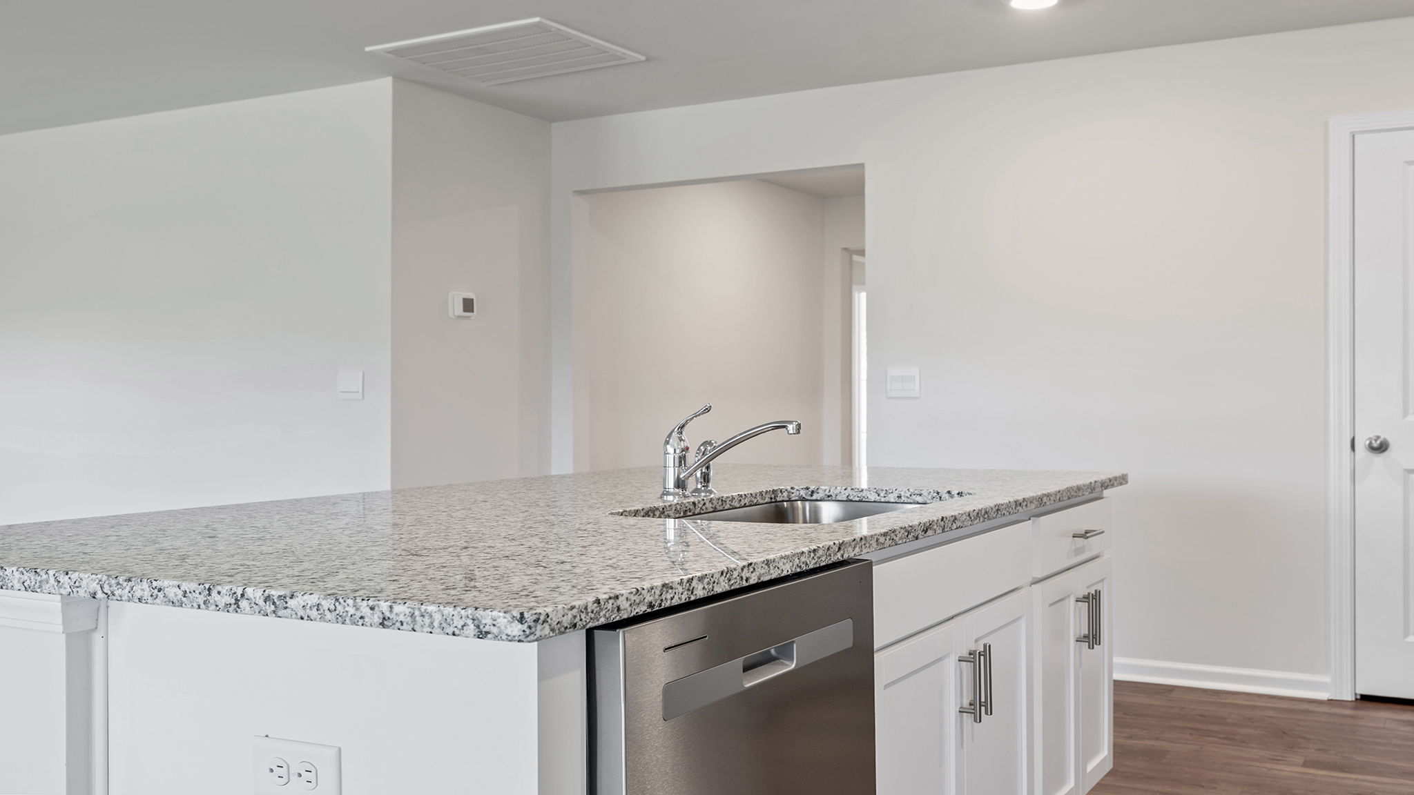 Kitchen with quartz countertops.