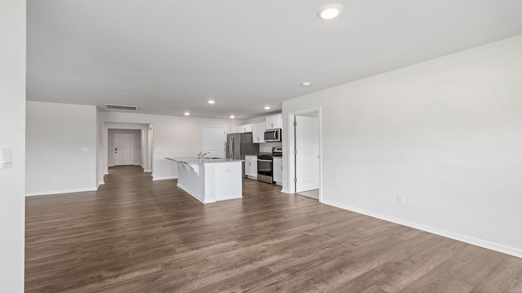 Kitchen with granite countertop.