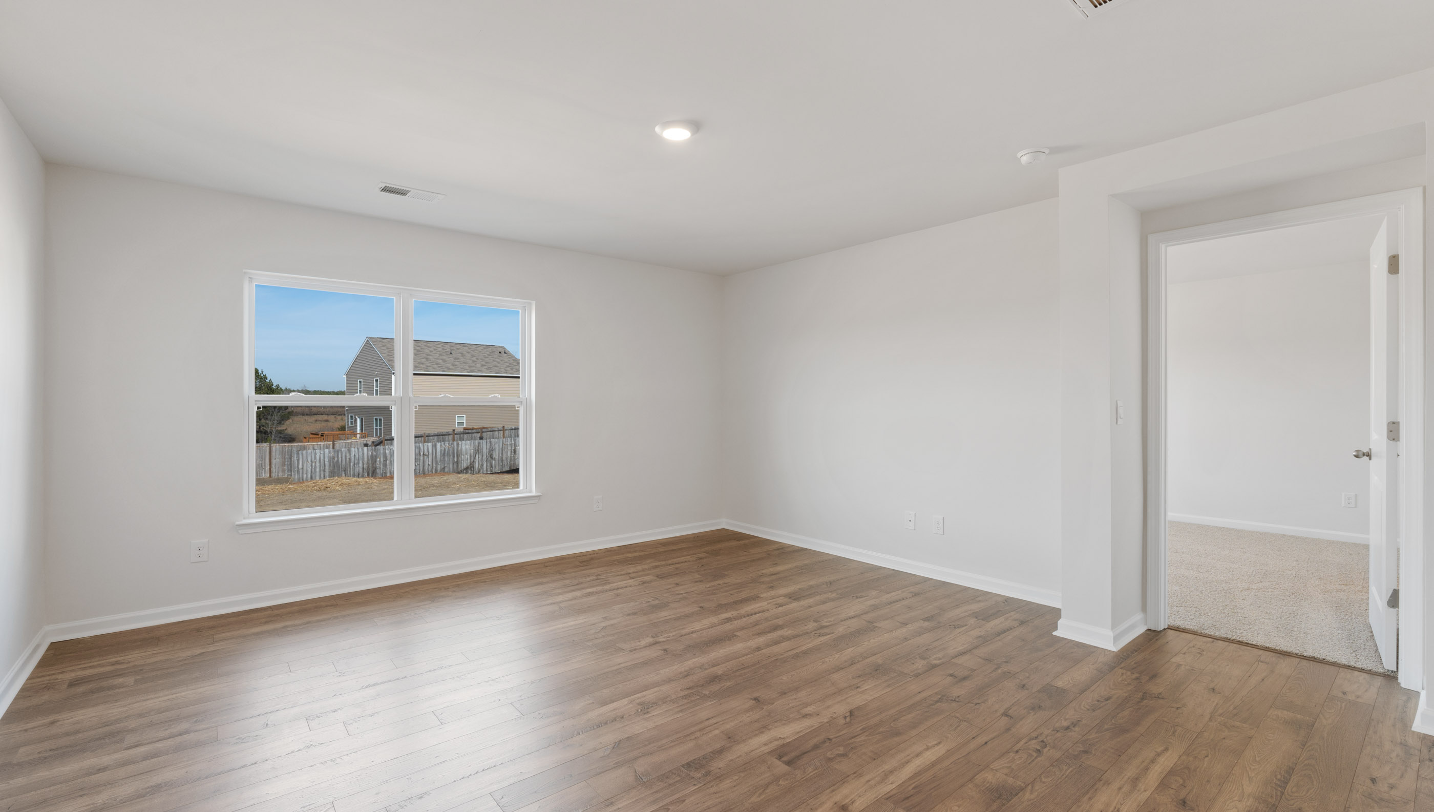 Family room with windows.