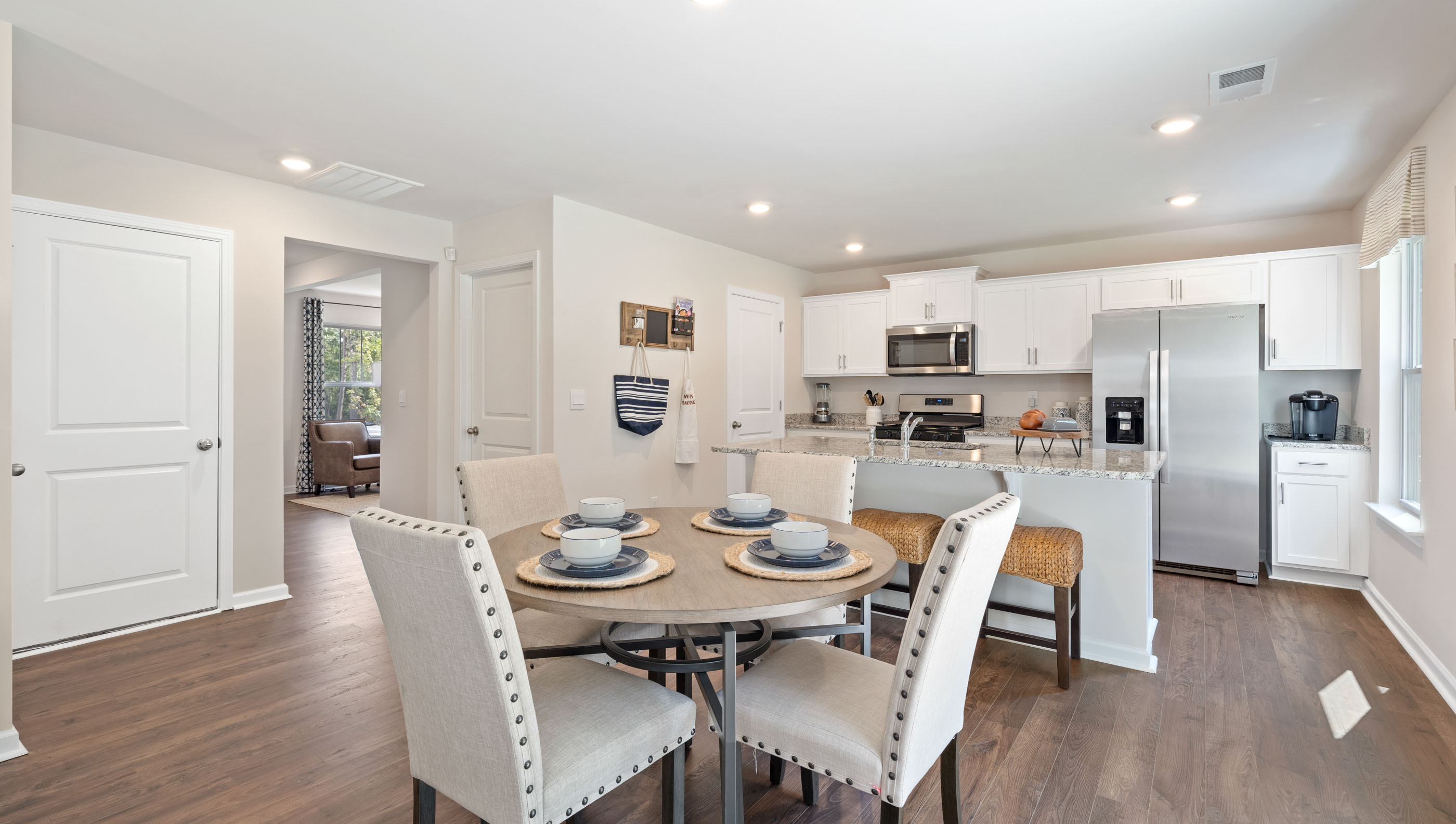 Dining room with view of kitchen.