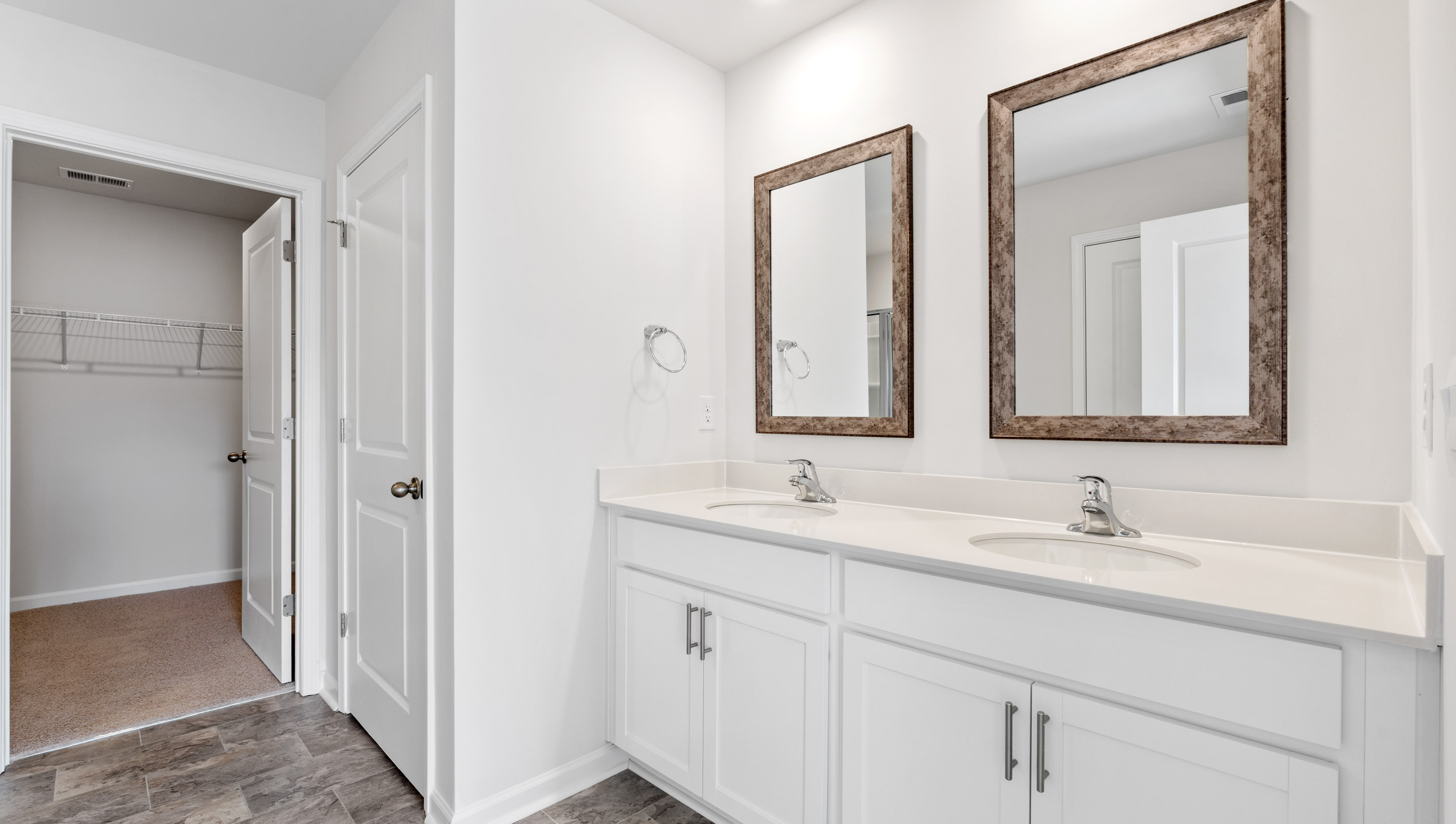 Bathroom with dual vanity.