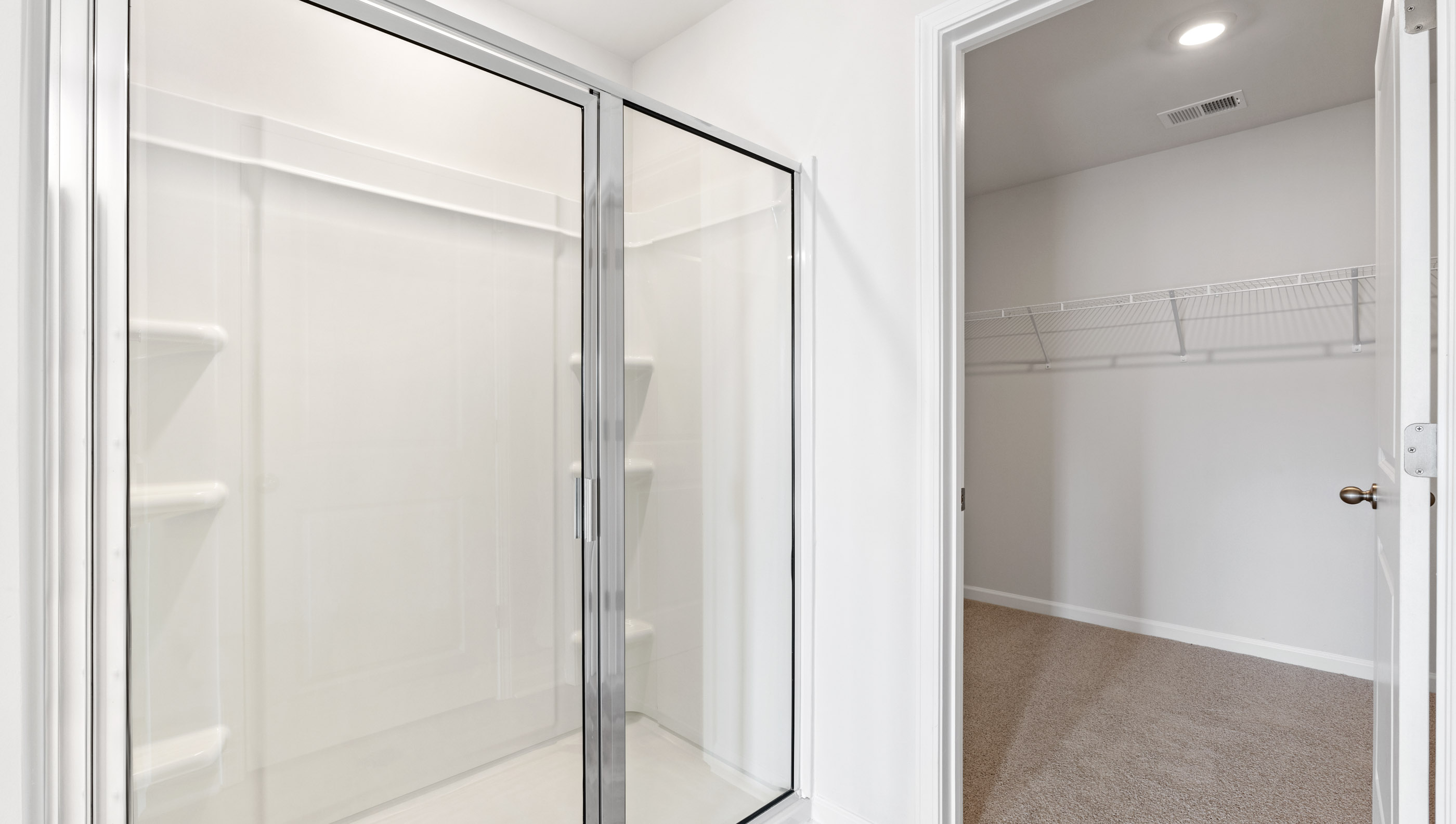 Bathroom with walk in shower.