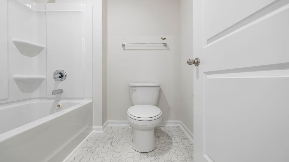 Bathroom with shower/tub combo.