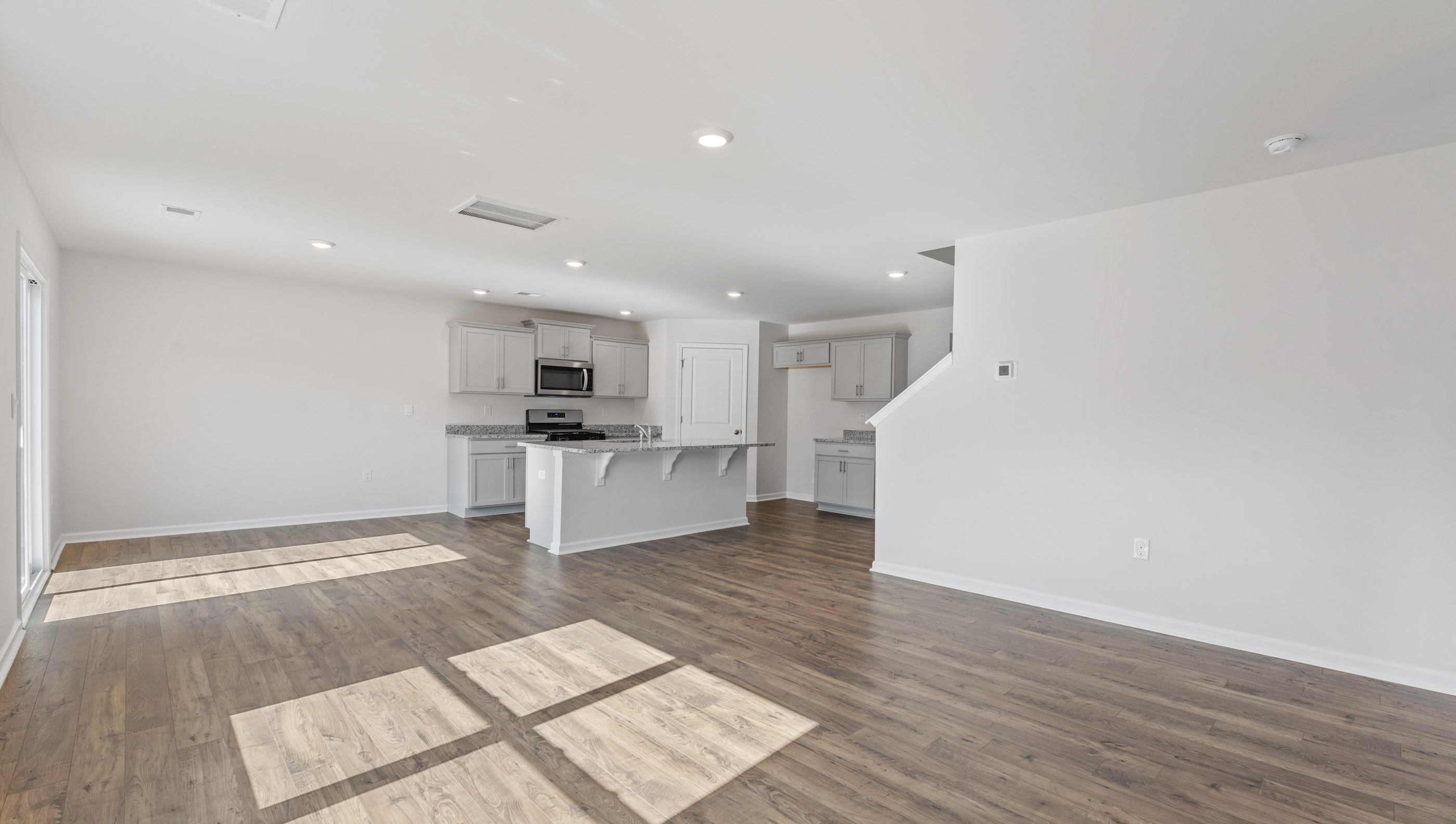 Great room facing kitchen.