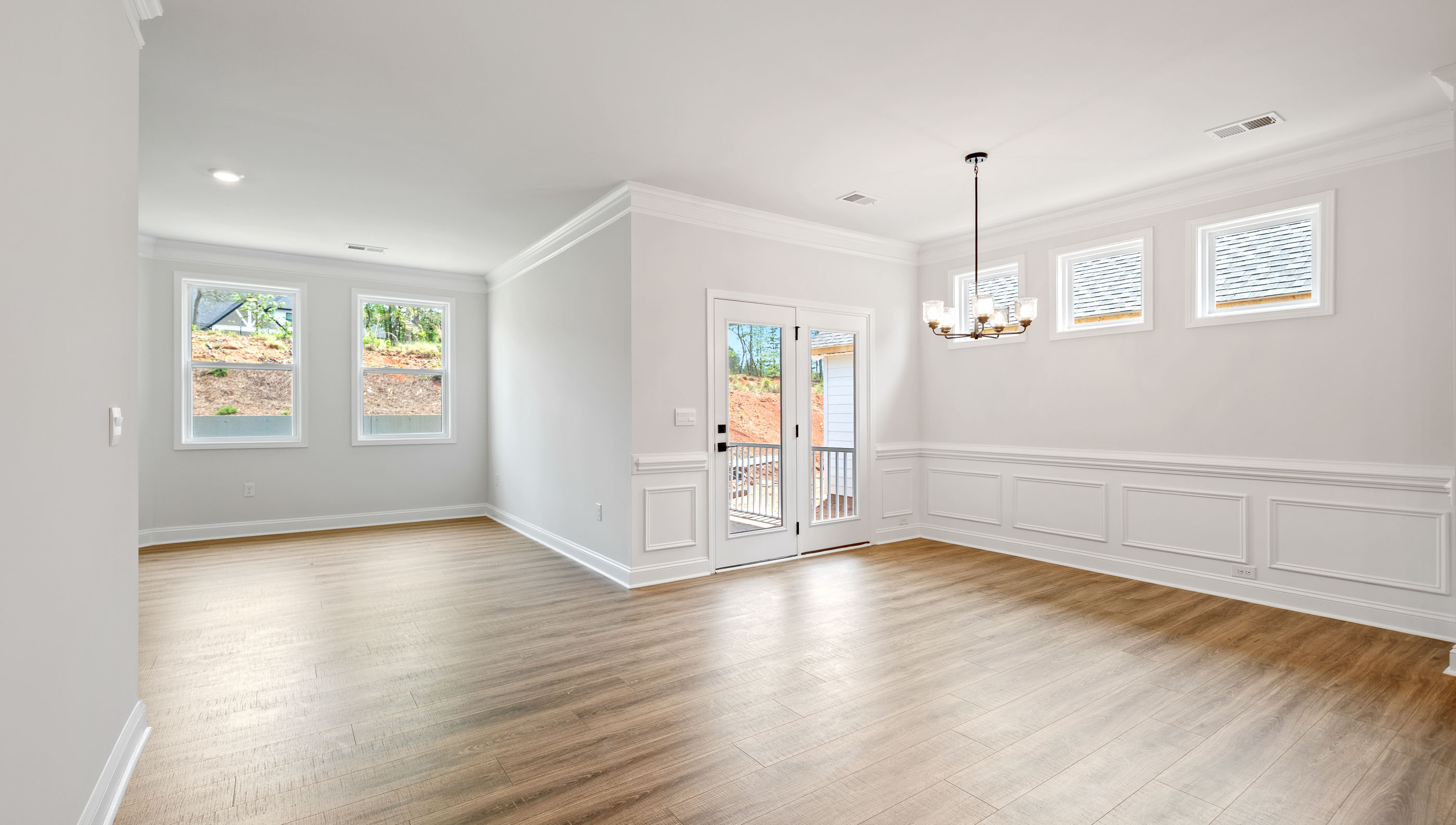 Family room with windows and fireplace.