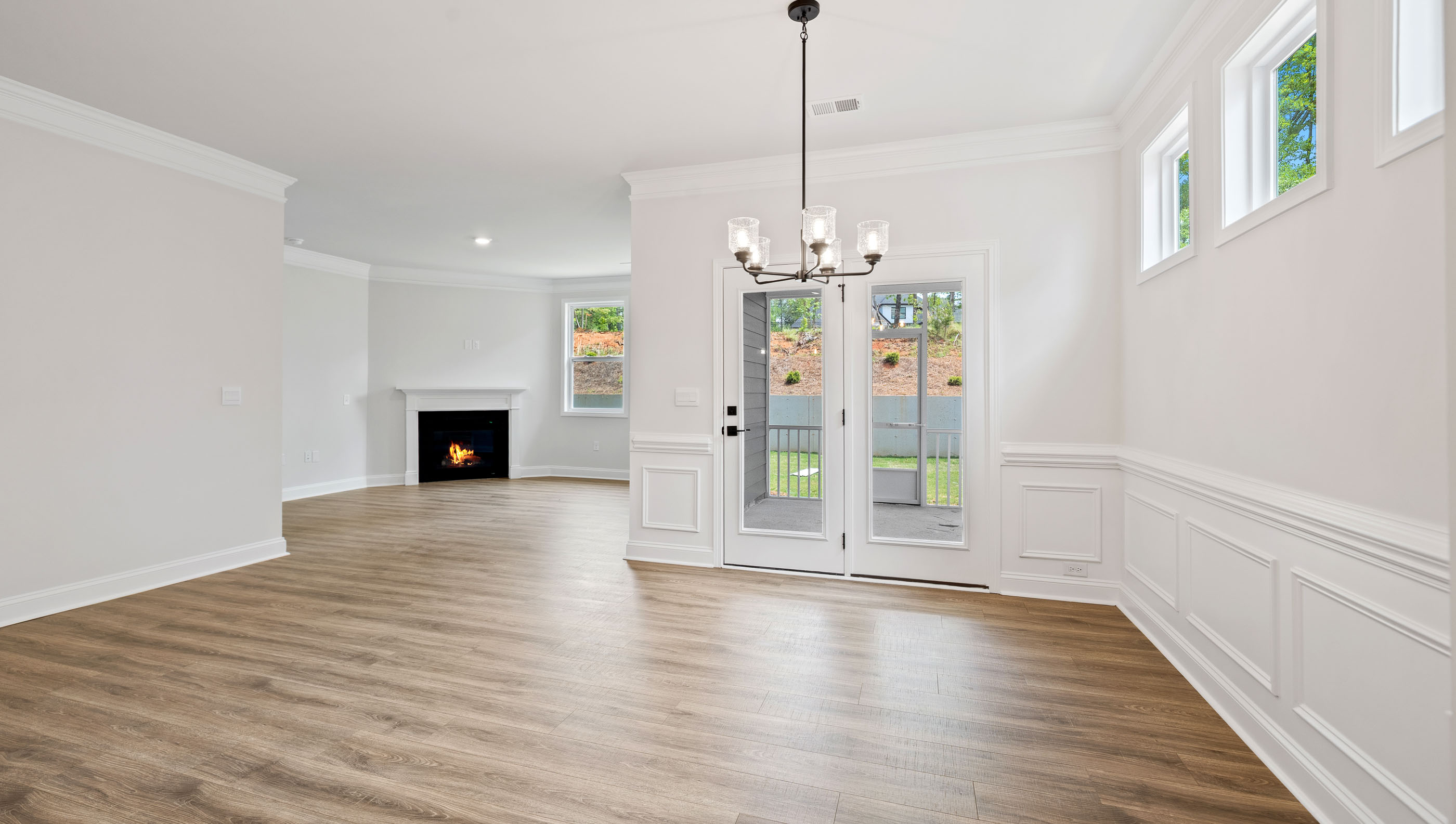 Family room with windows and fireplace.
