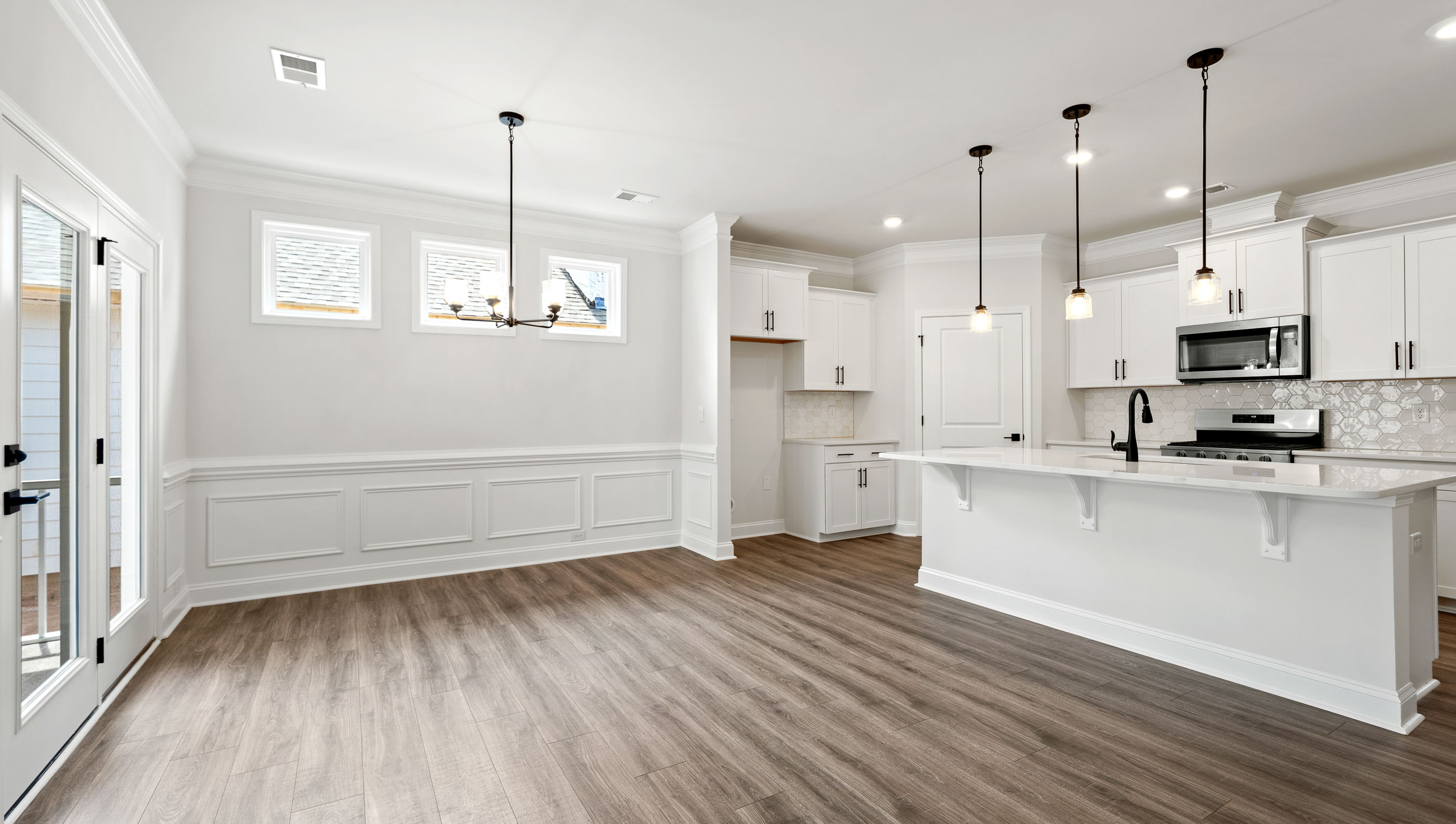Family room with windows and fireplace.