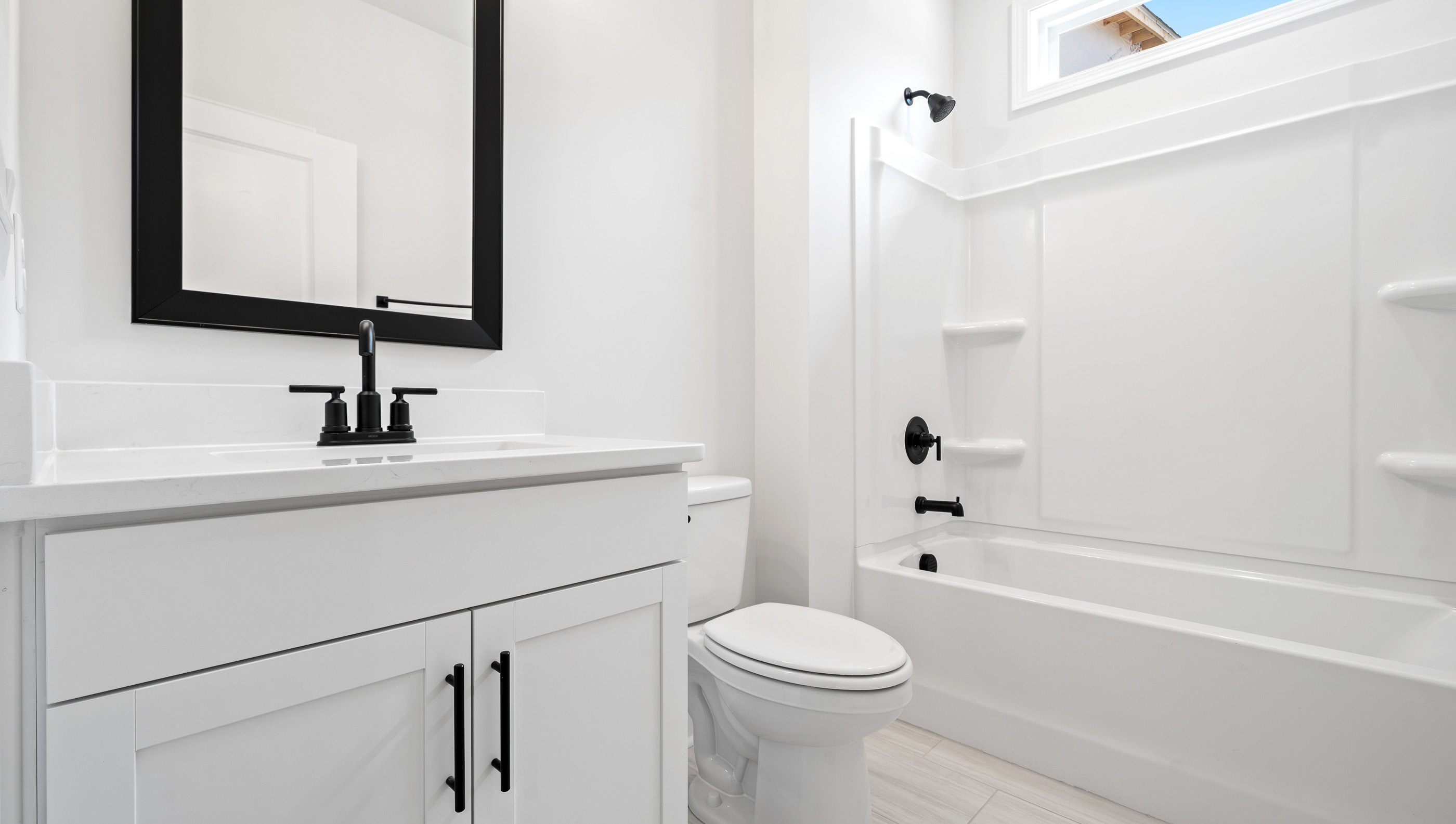 Bathroom with sink and tub.