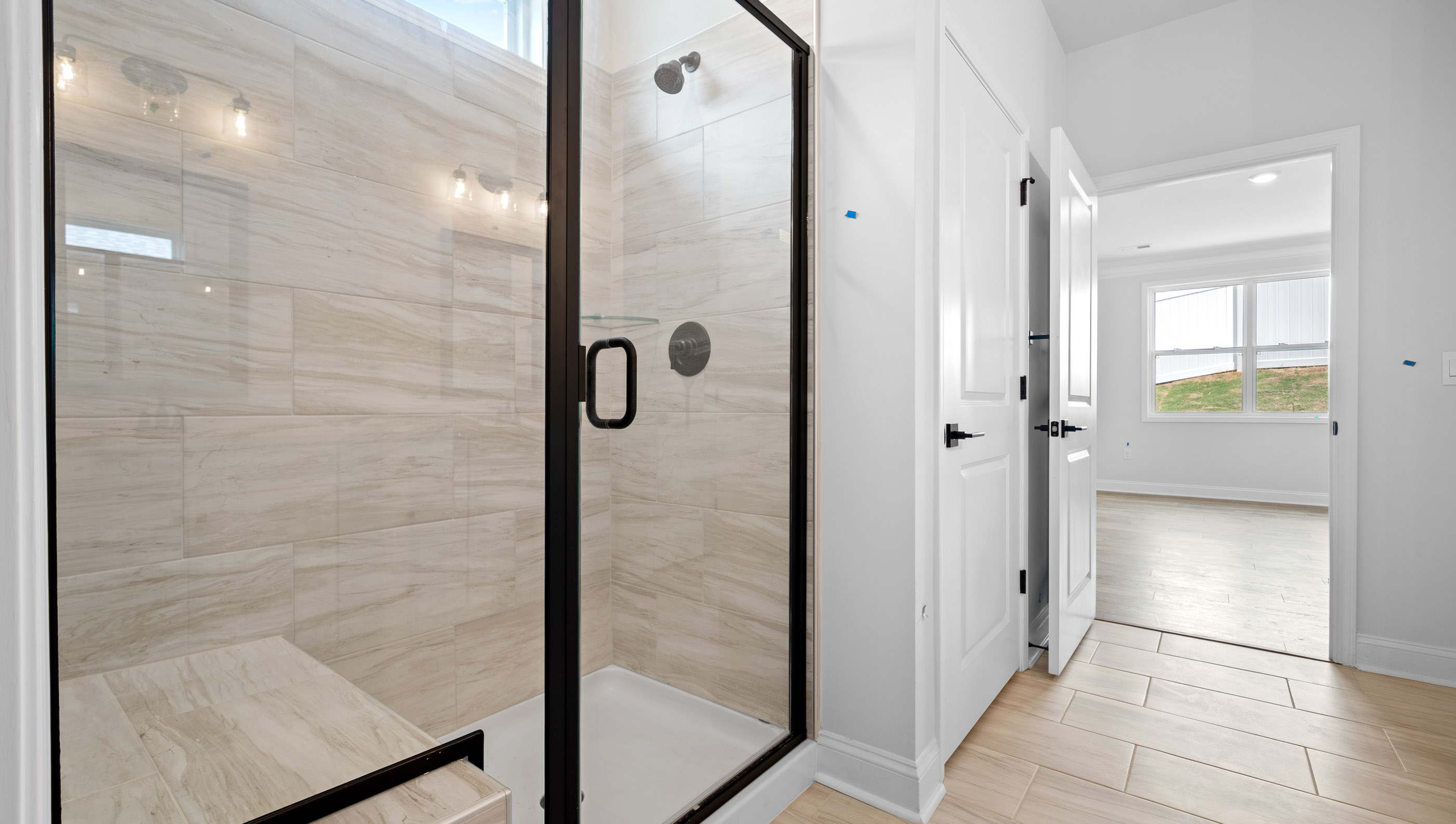 Bathroom with walk in shower.