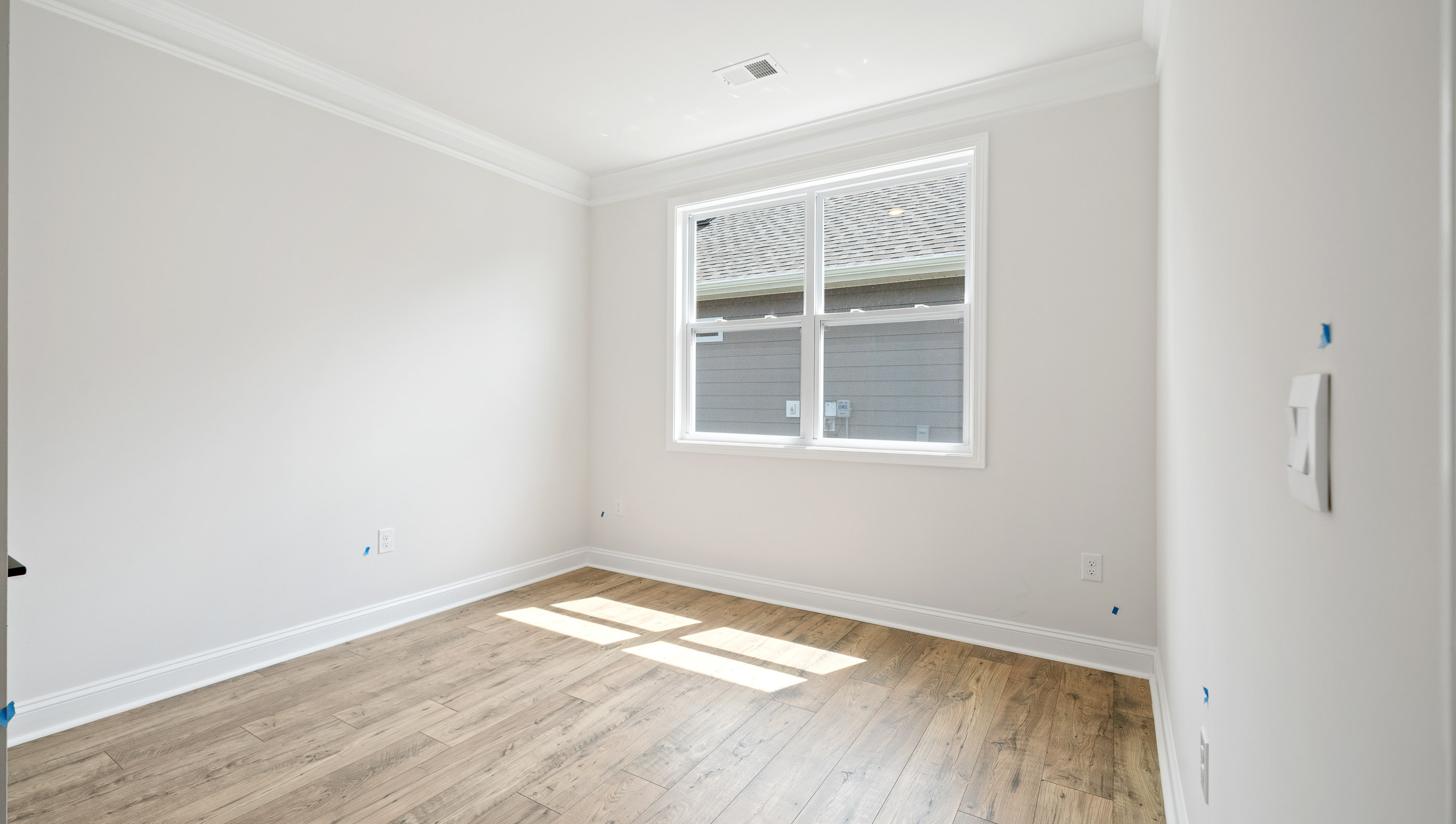 Bedroom with windows.