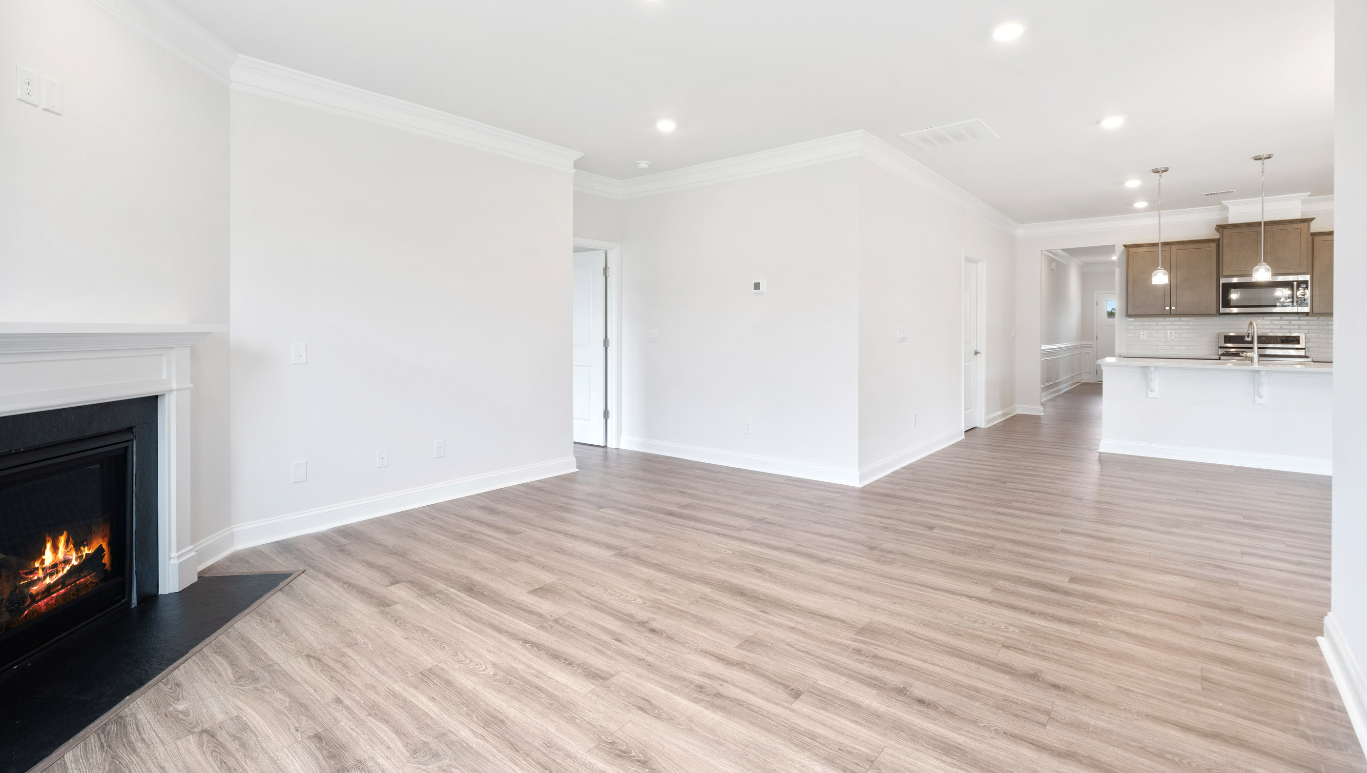 Family room with windows and fireplace